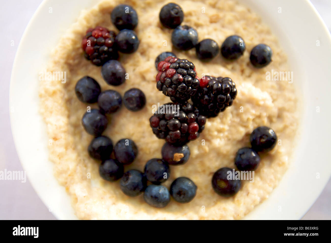 Healthy Breakfast, Porridge with fresh fruit Stock Photo
