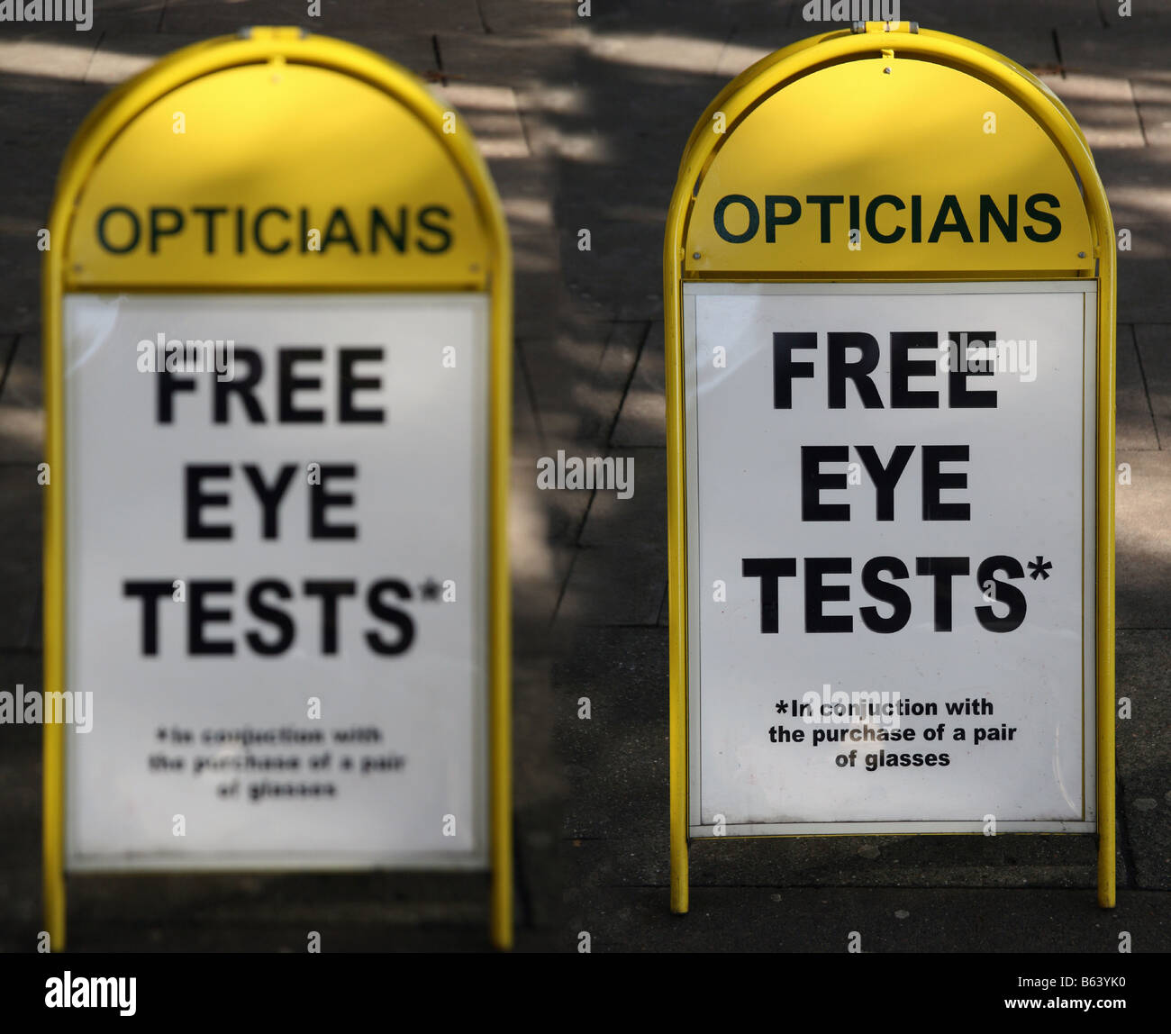 'Before' and 'after' eye test sign outside opticians, London Stock Photo