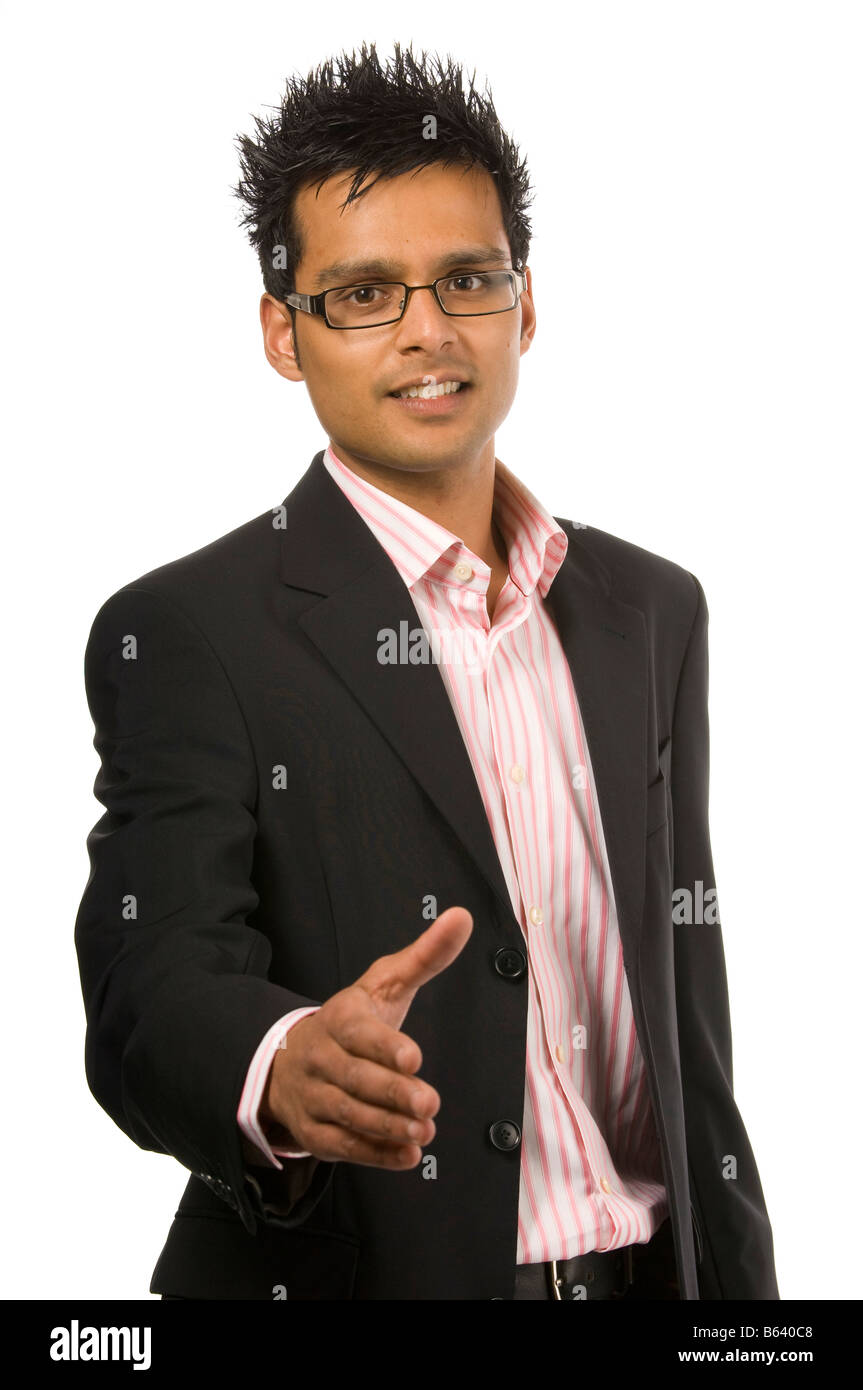 Asian male in glasses isolated on a white background offering hand to shake Stock Photo
