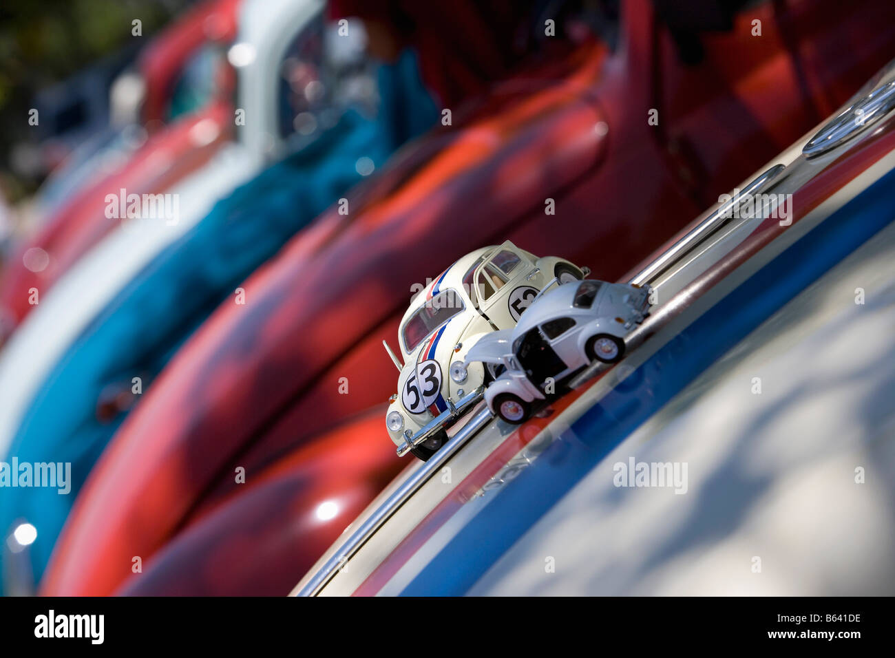 Brazil, Sao Paulo, VW Volkswagen beetle club. Miniatures on hood of VW cars Stock Photo
