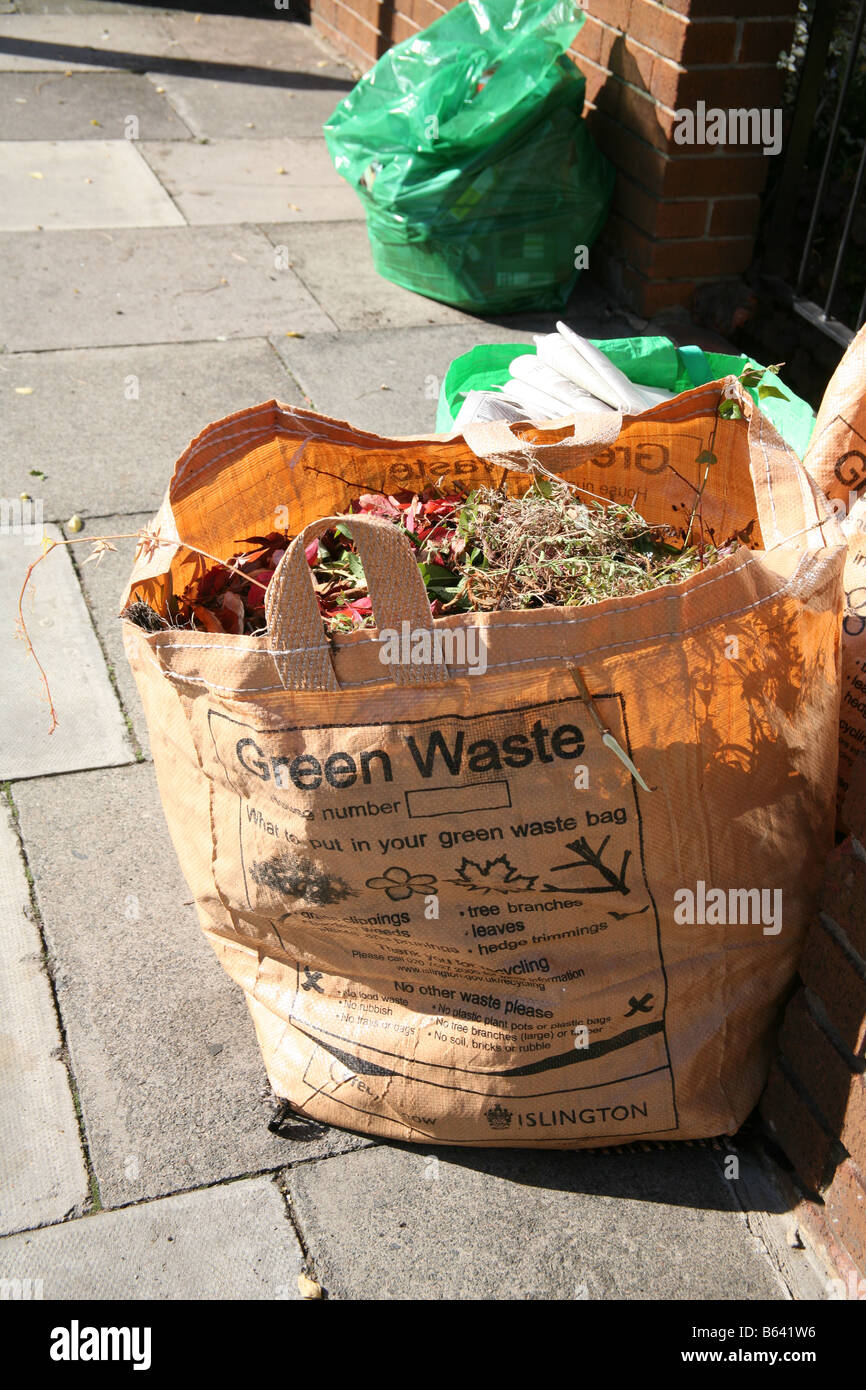 Garden waste waiting for collection by council in London street Stock
