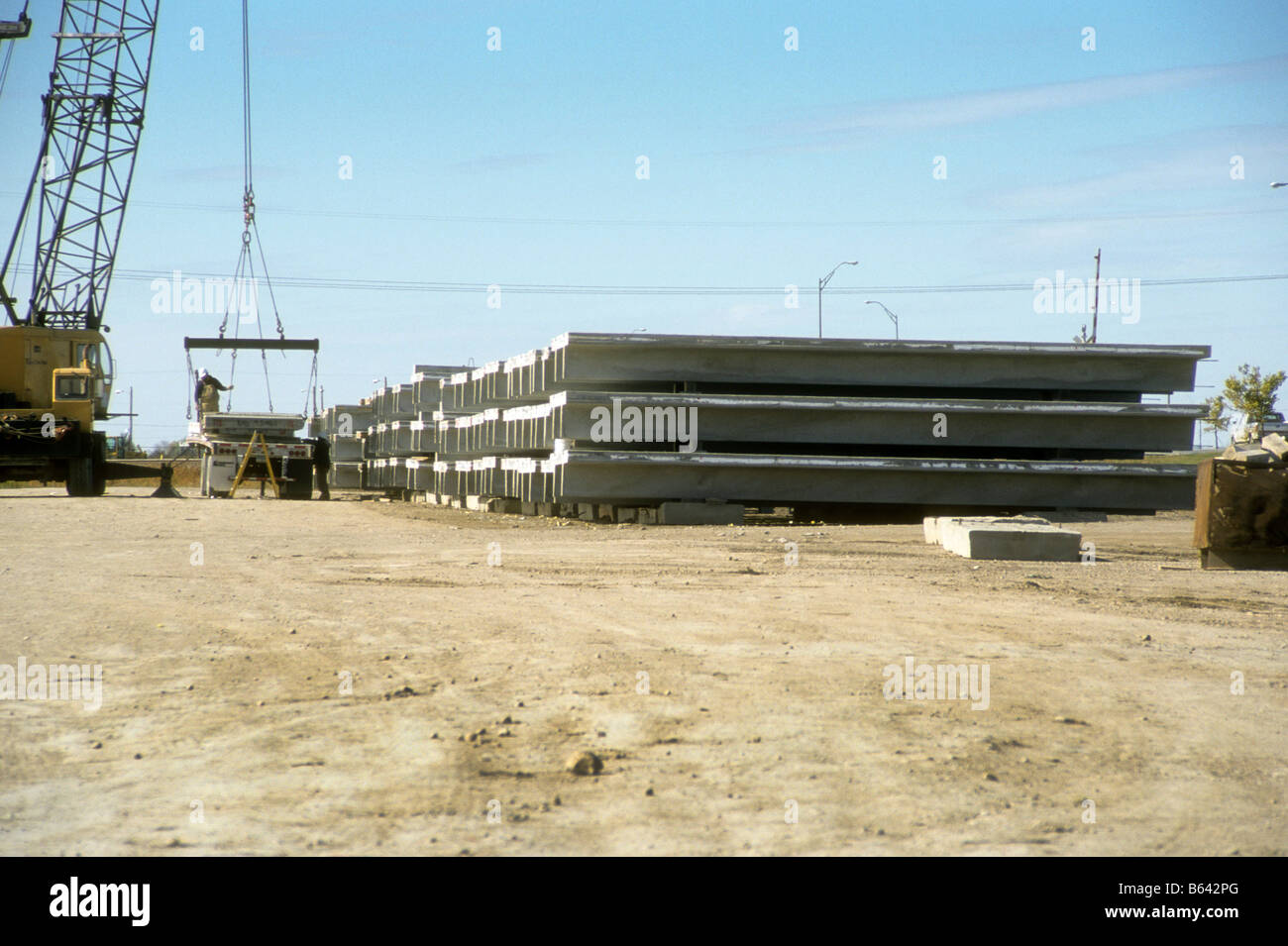 Prestressed concrete beams are made and stacked in Grand Forks, North Dakota, USA. Stock Photo