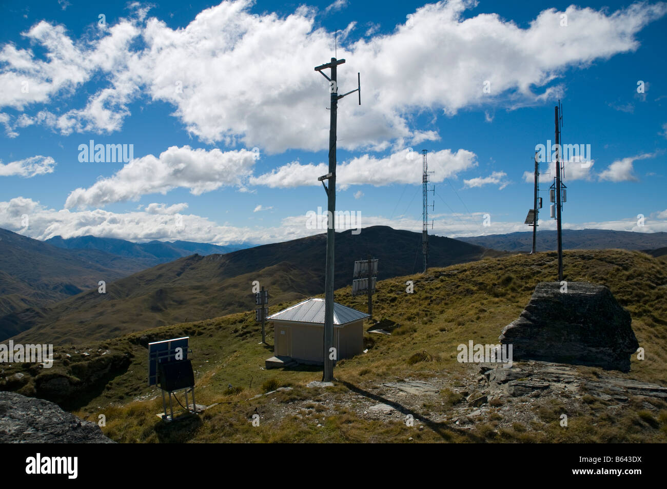 Telecommunication masts at the summit of Rock Peak, near Queenstown, South Island, New Zealand Stock Photo