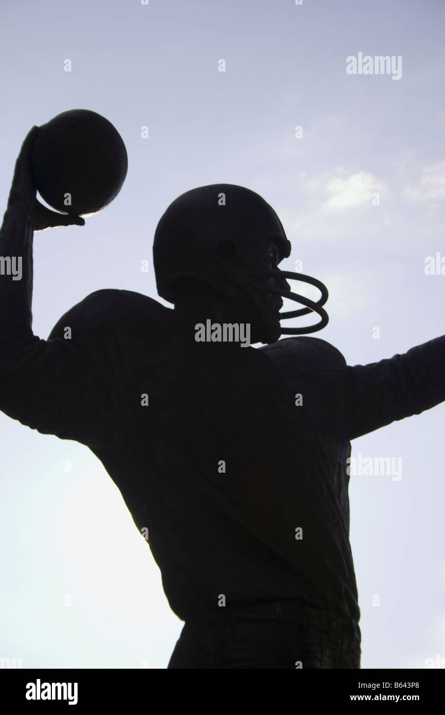 Silhouette of Baltimore Colts Quarterback Johnny Unitas statue at M&T Bank Stadium Baltimore, Maryland Stock Photo