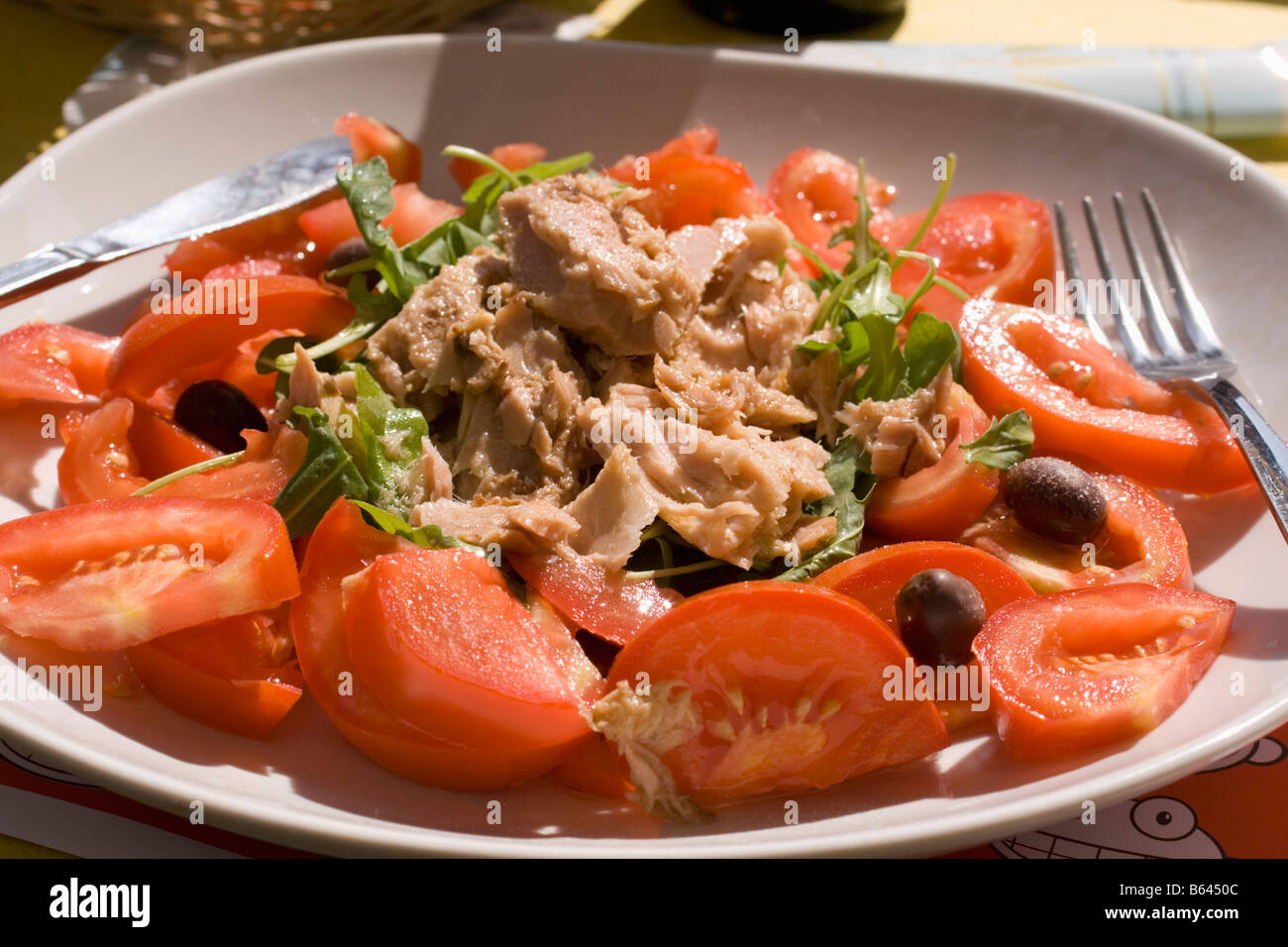 An Italian style tuna salad plate at an outdoor cafe in Turin Stock Photo
