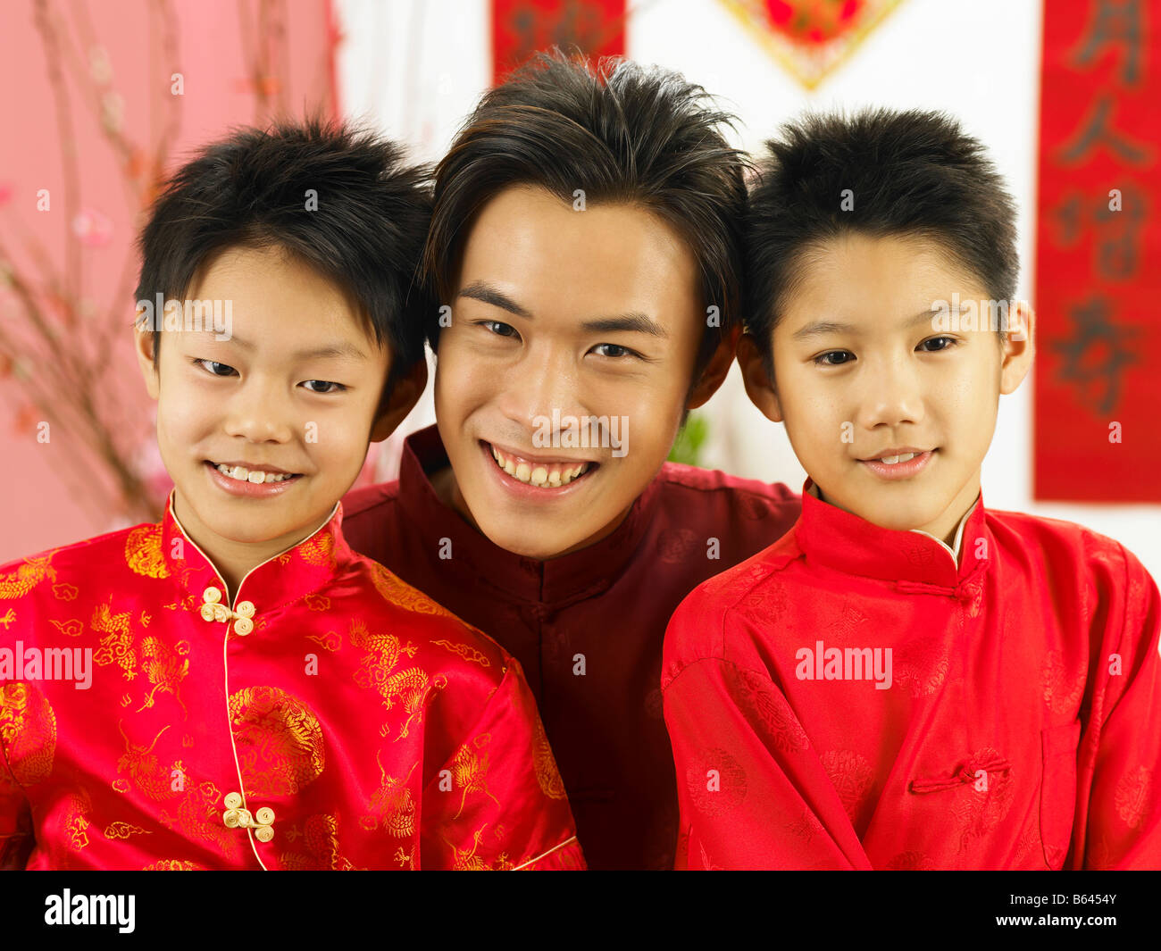 portrait of father and sons in traditional costume Stock Photo - Alamy