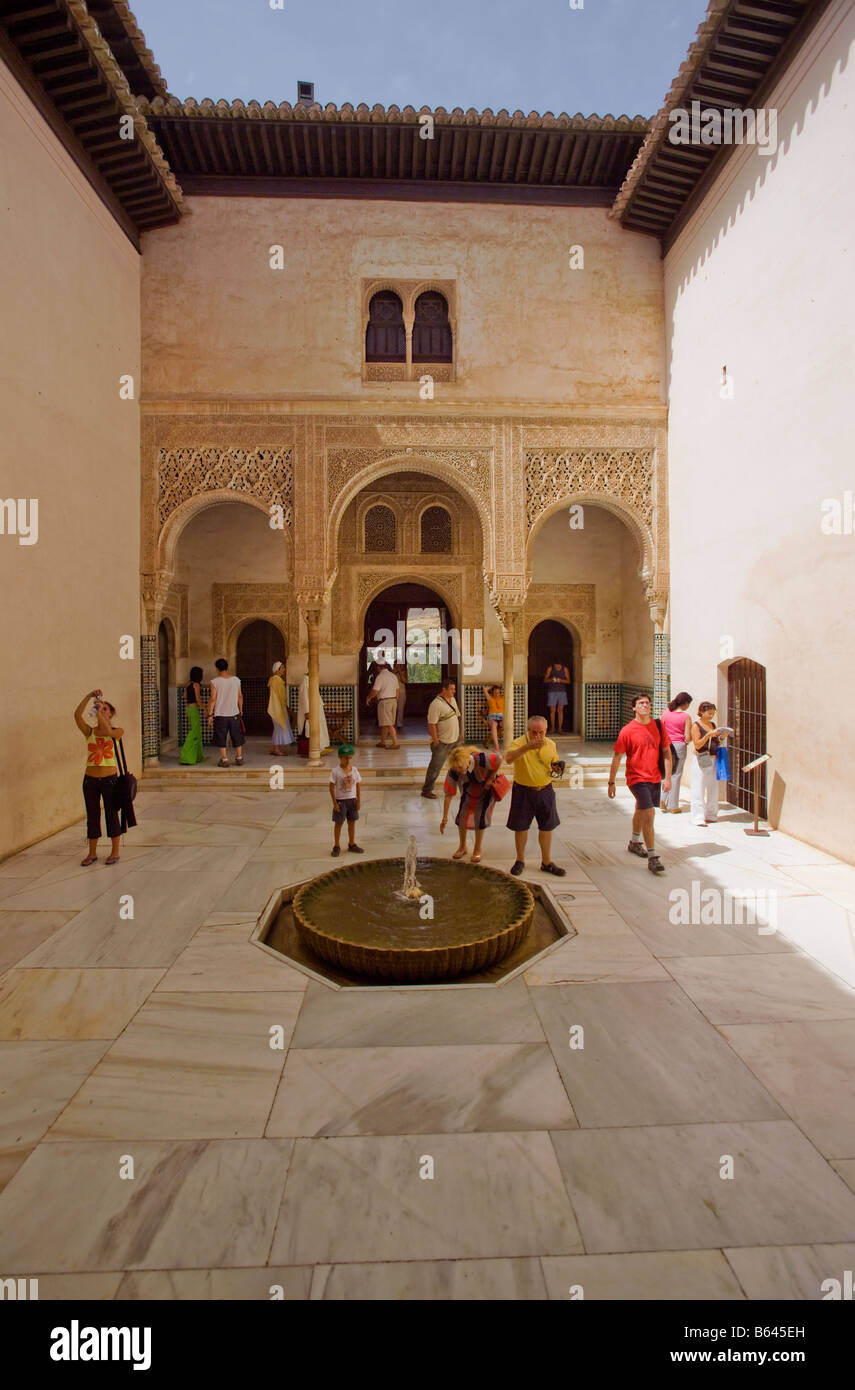 Architecture at the Alhambra. Open space with fountain in middle. Granada, Andalusia, Spain
