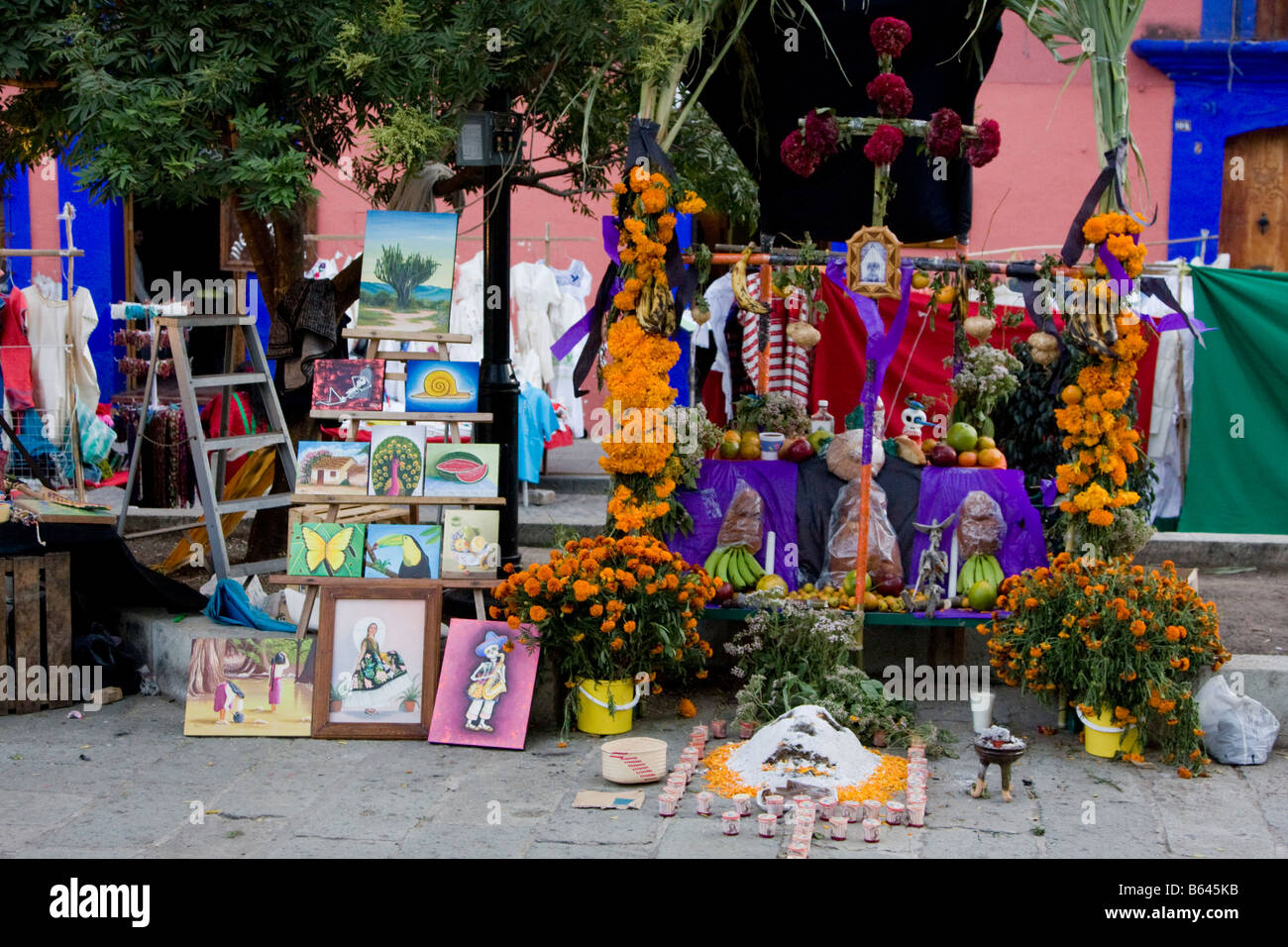 Oaxaca, Mexico. Day of the Dead. Altar in Memory of the Dead at Vendor's Stand Selling Folk Art Paintings. Stock Photo