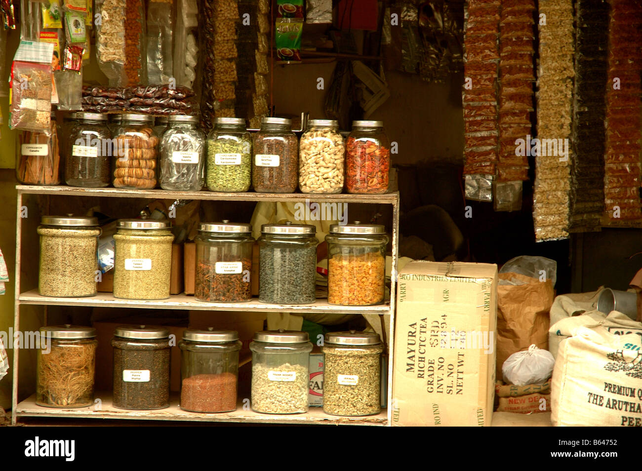 Jars of spices in the old spice market area of Mantacherry, Cochin, Kerala, India Stock Photo