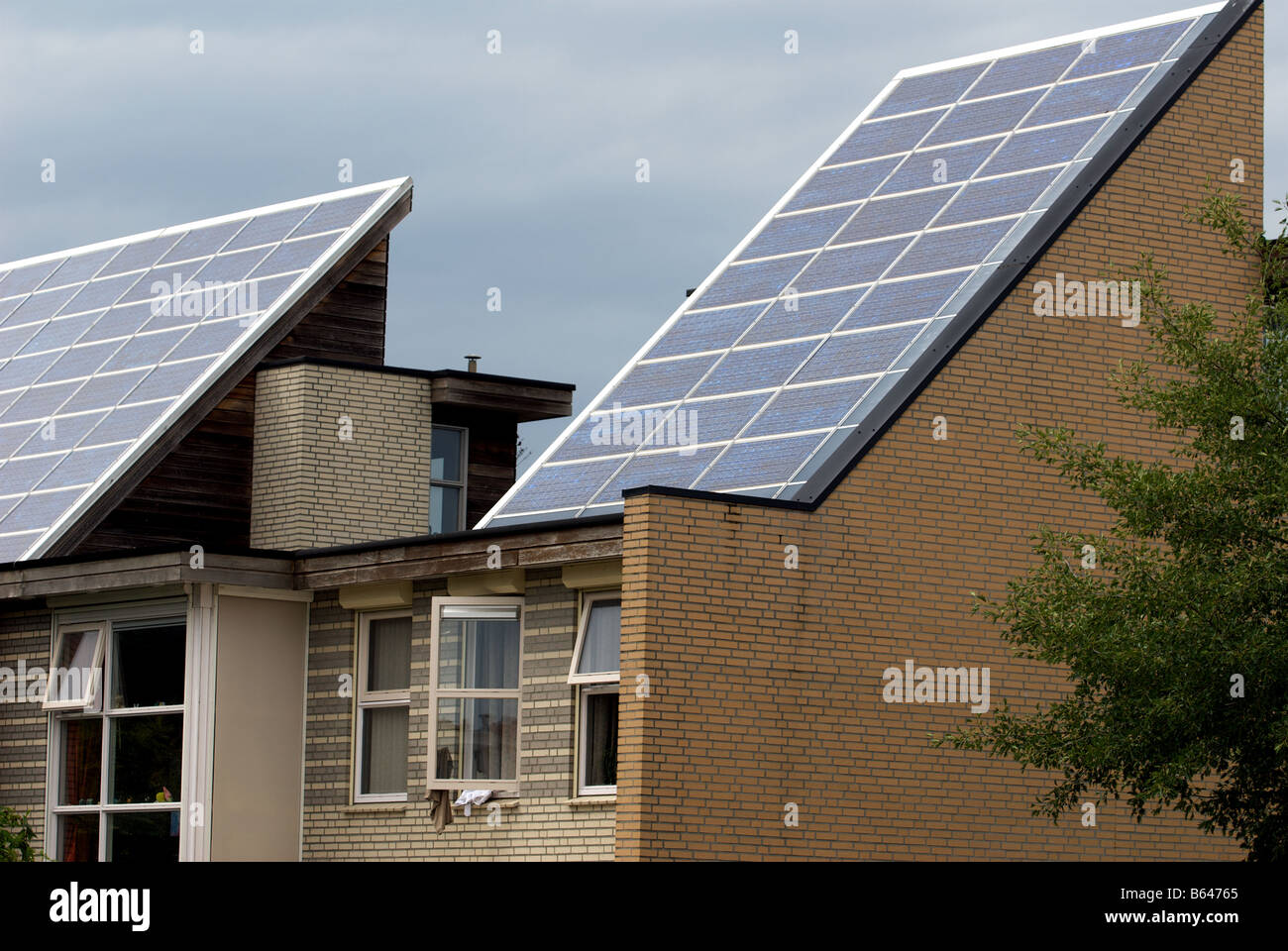 Solar panels fitted to houses on the world's largest solar hosing estate, Nieuwland, Amersfoort, Netherlands. Stock Photo