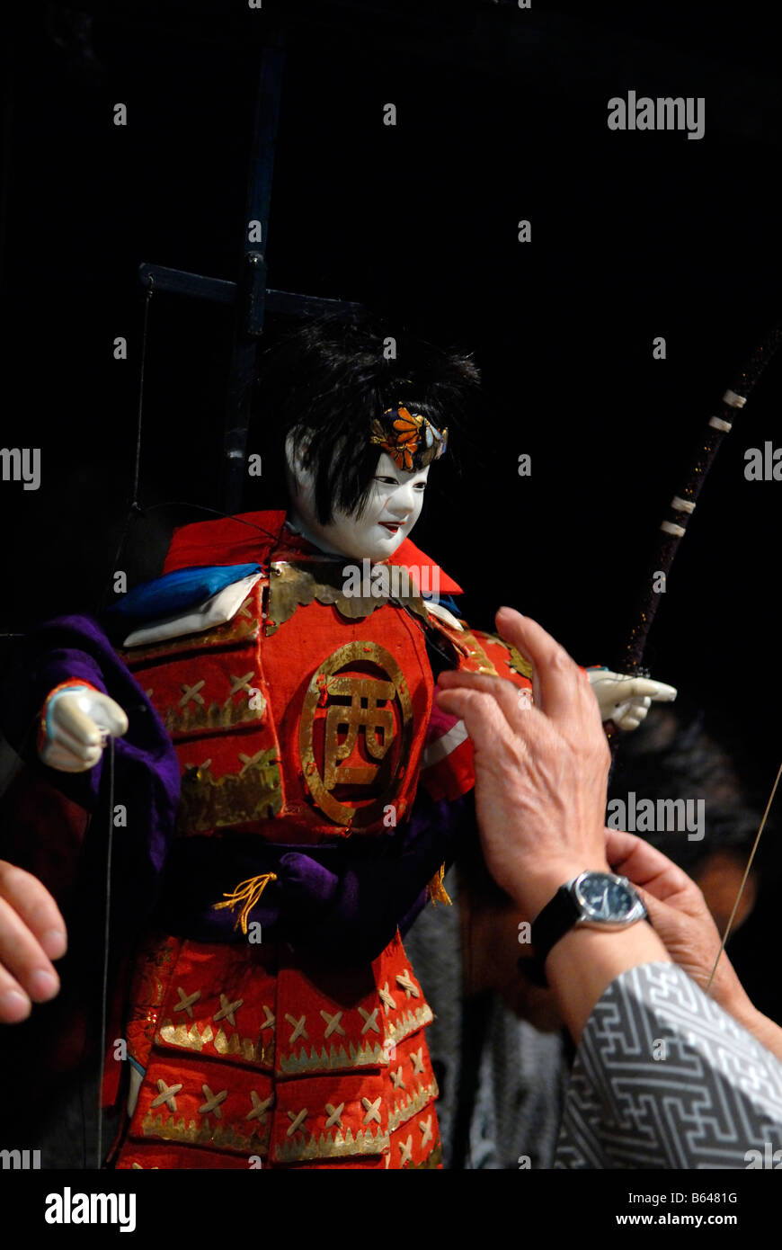 Puppeteers adjust traditional Japanese Karakuri puppet Stock Photo Alamy