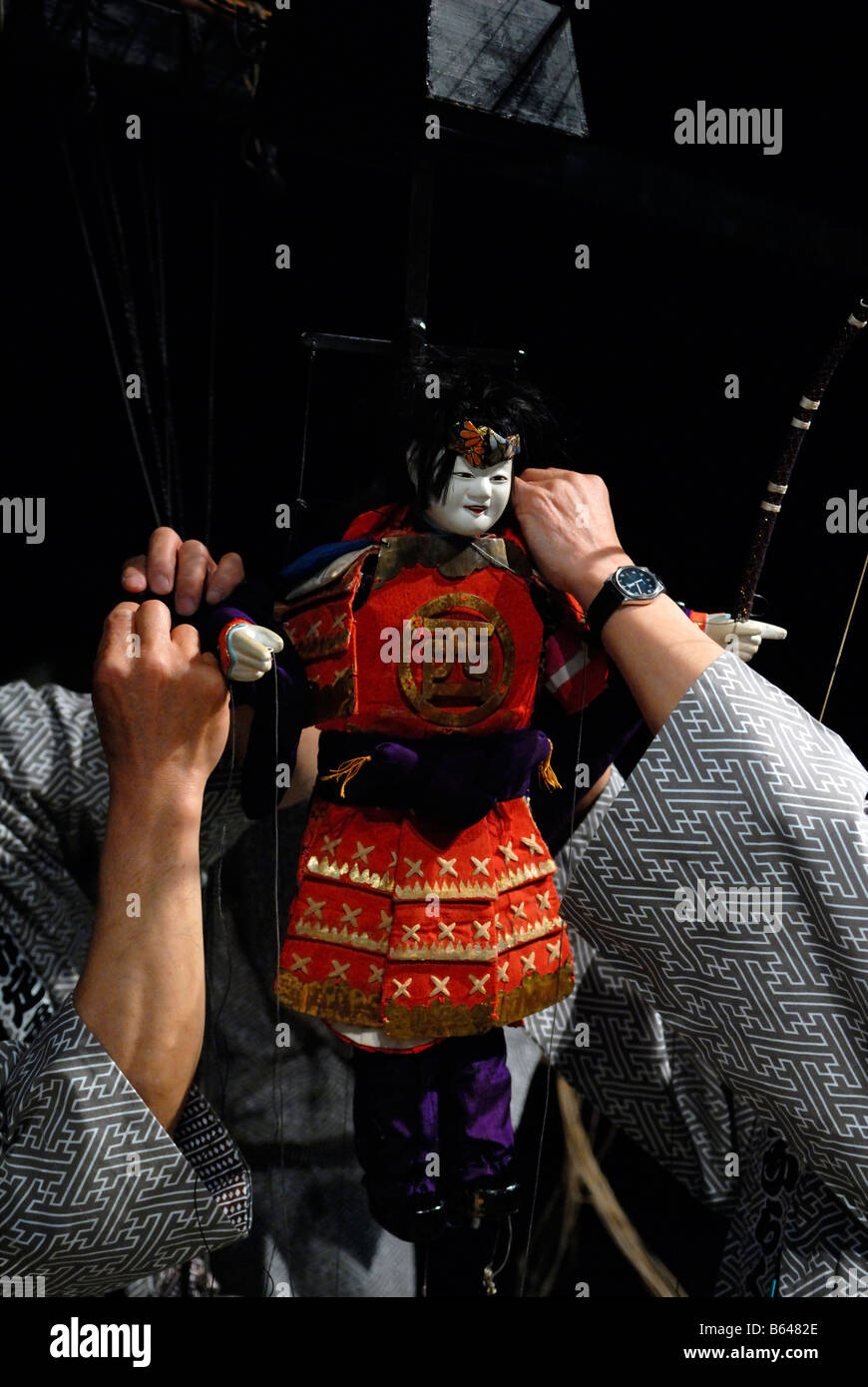 Puppeteers adjust traditional Japanese Karakuri puppet Stock Photo Alamy
