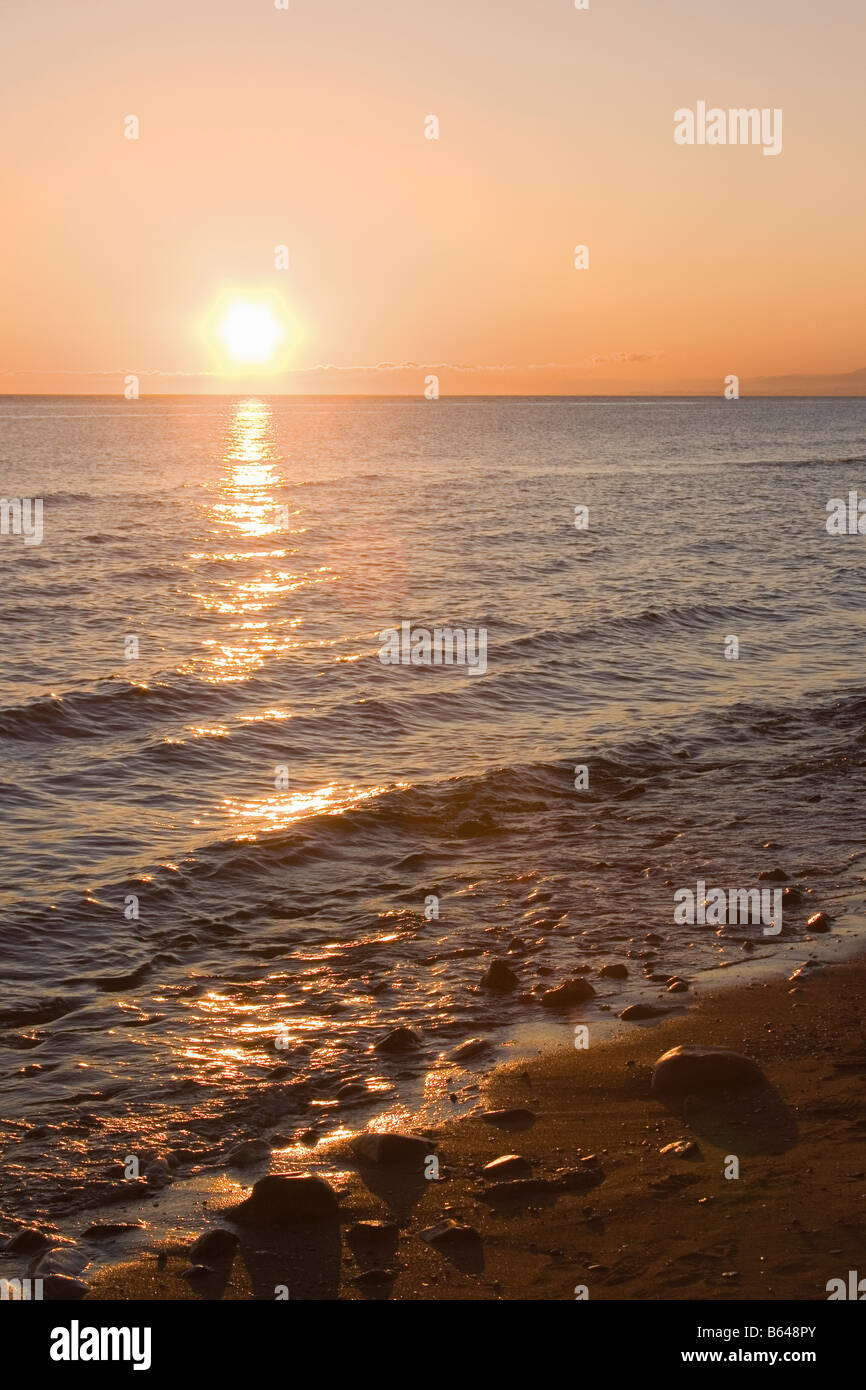 Estepona Costa del Sol Malaga Province Spain Sunset over sea Stock Photo