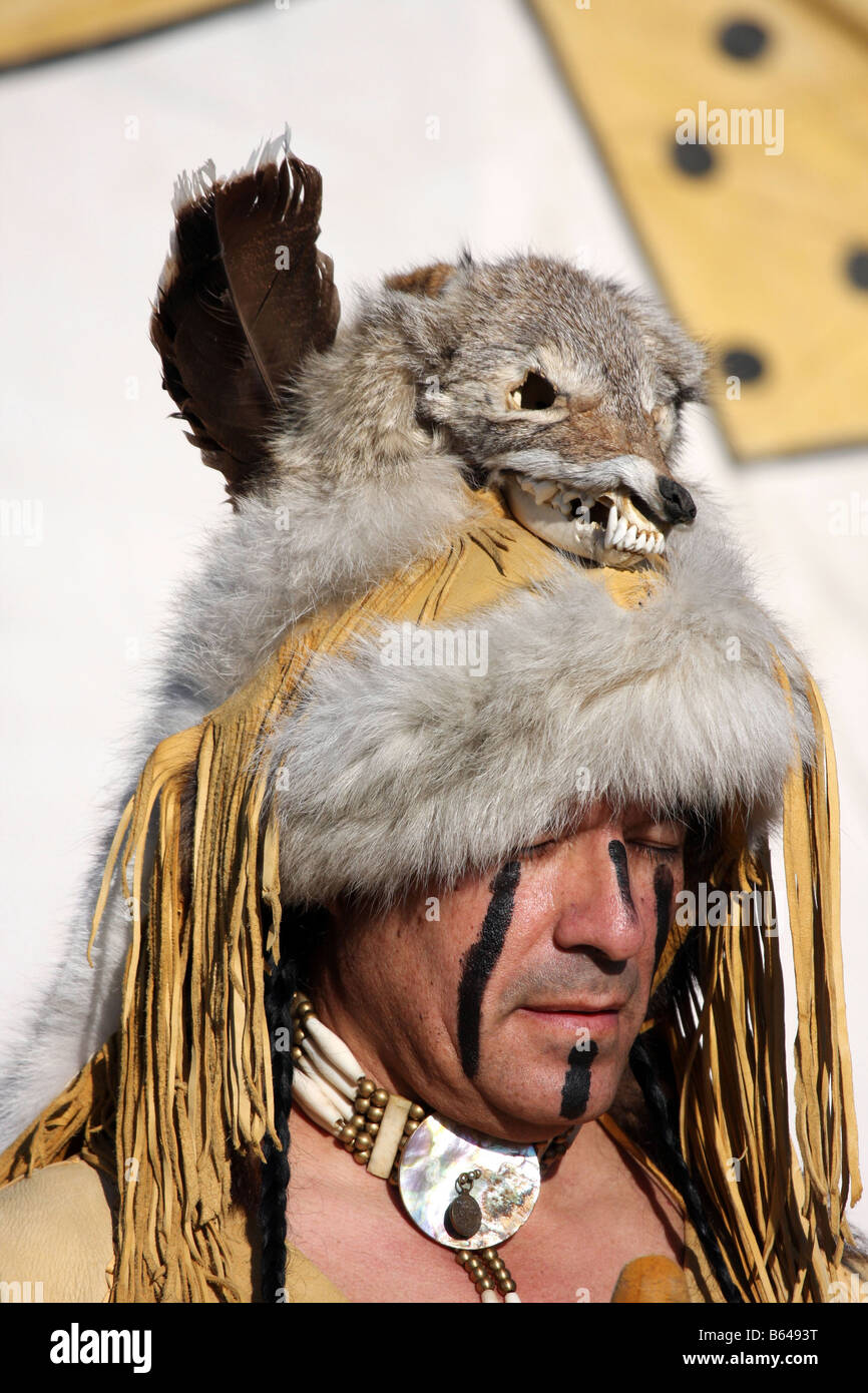 Apache Native American Indian with a animal fur hat or headdress Stock Photo Alamy