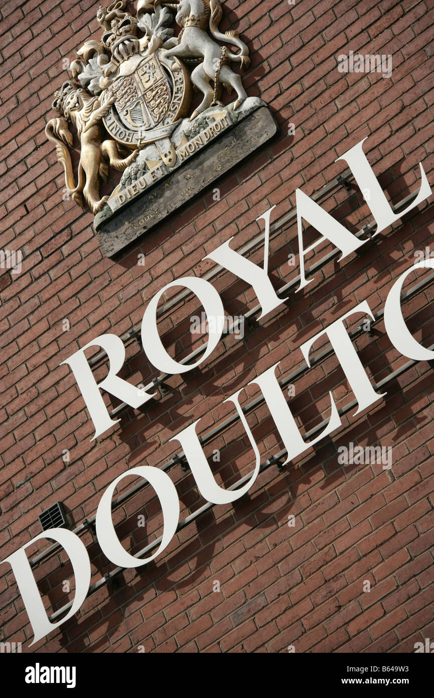 City of Stoke on Trent, England. The Royal Doulton sign and Royal Crest on the wall of disused factory in Burslem. Stock Photo