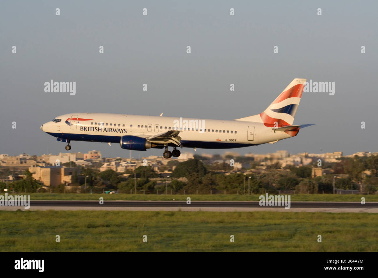Holiday travel. British Airways Boeing 737-400 landing at Malta International Airport Stock Photo