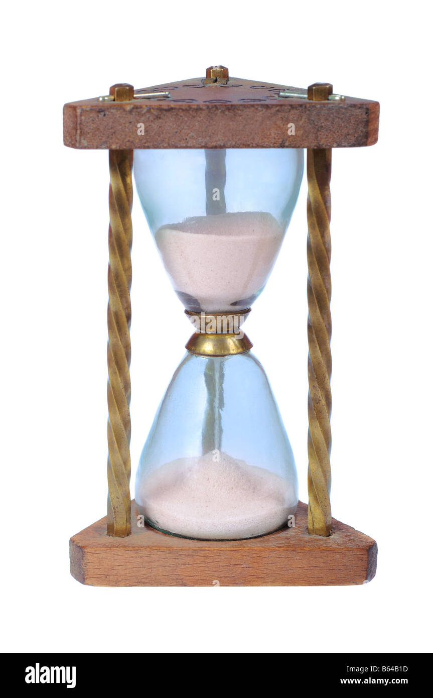 Old wooden hourglass illuminated isolated on white background. Stock Photo