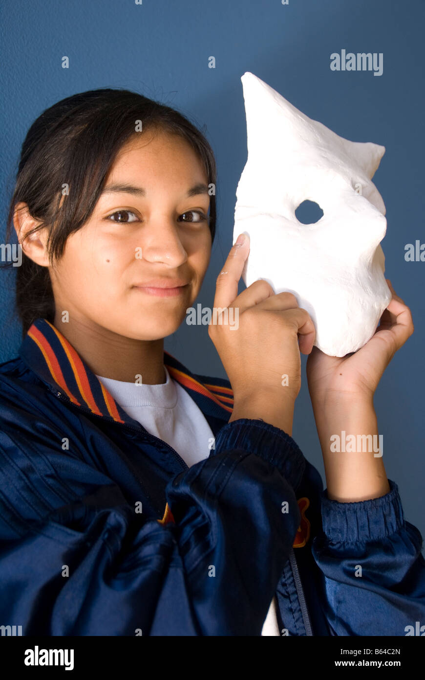 San Antonio's Say Si Art Studio, Youth Arts Program, student with mask for Day of the Dead (Dia de los Muertos) Festival Stock Photo