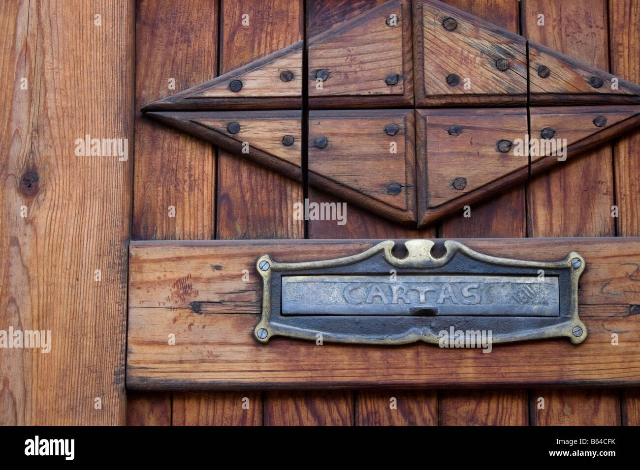 Letterbox or mail slot in wooden door in San Miguel de Allende Mexico
