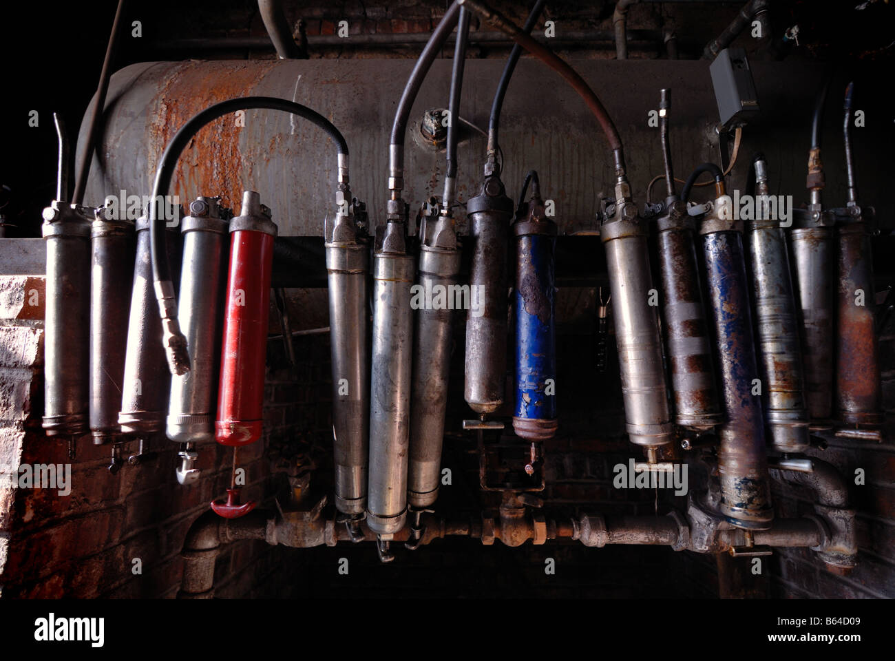 Old grease guns Stock Photo Alamy