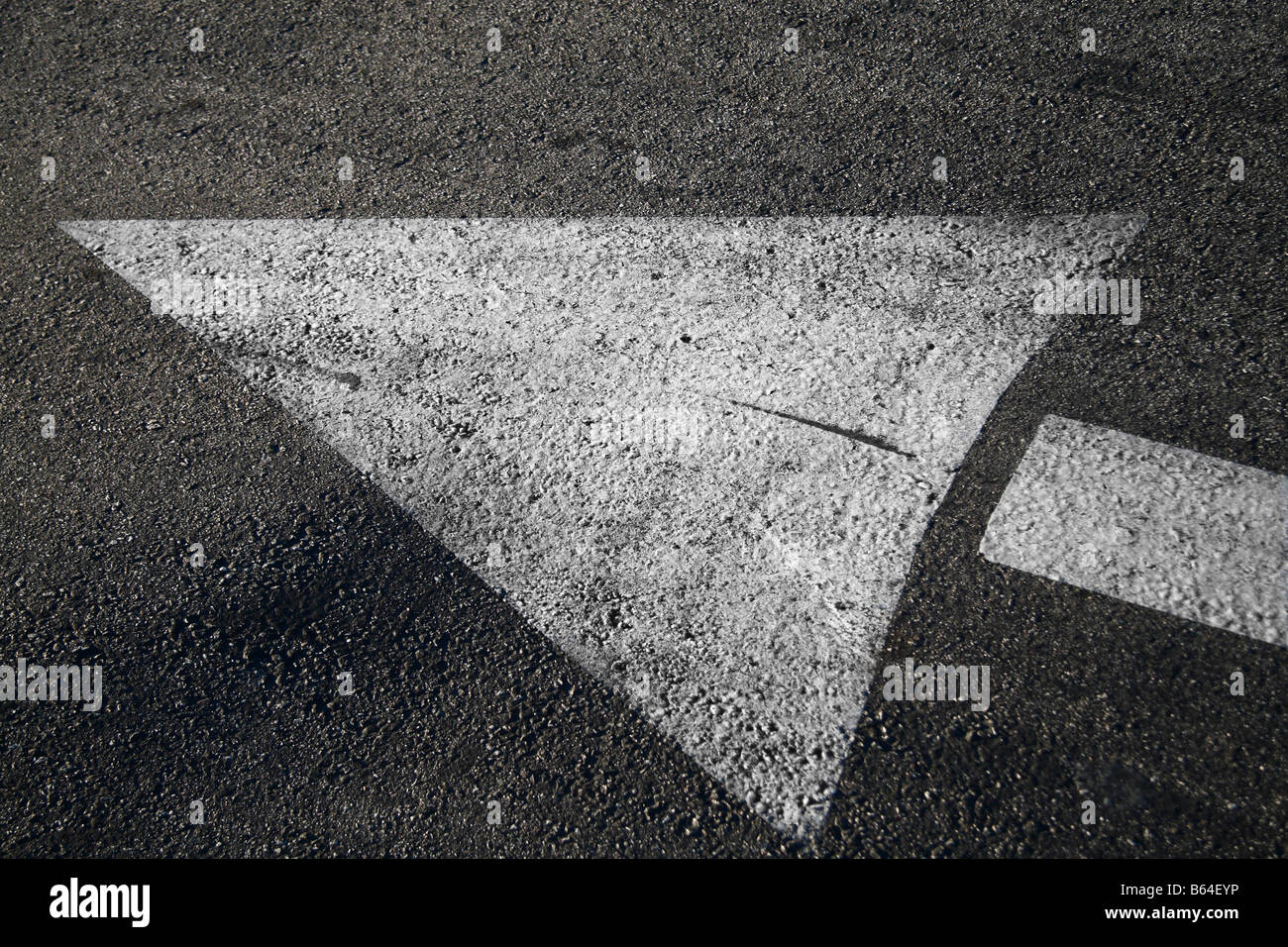 Direction Arrow On Road Stock Photo Alamy direction-arrow-on-road-stock-photo-alamy