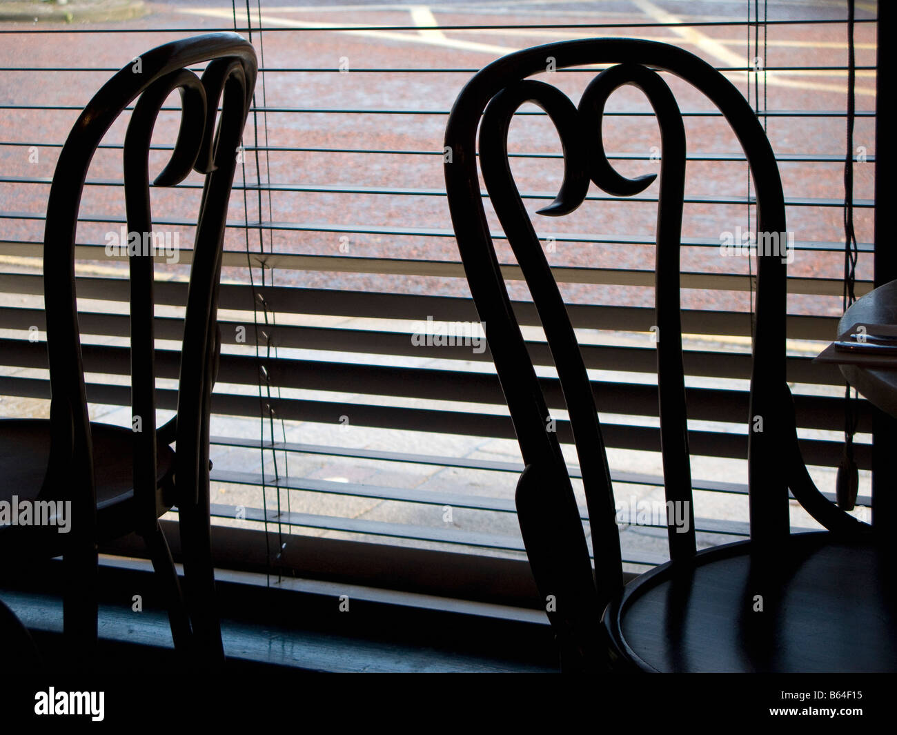 Two Empty Wooden Chairs in Restaurant Stock Photo Alamy
