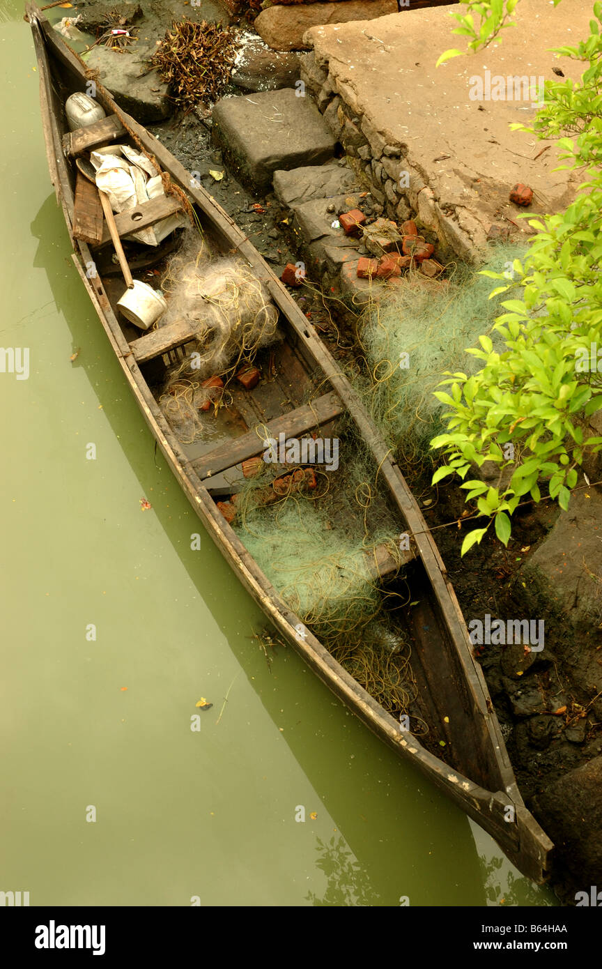 Wooden canoe on the Backwaters of Kerala in Southern India Stock Photo
