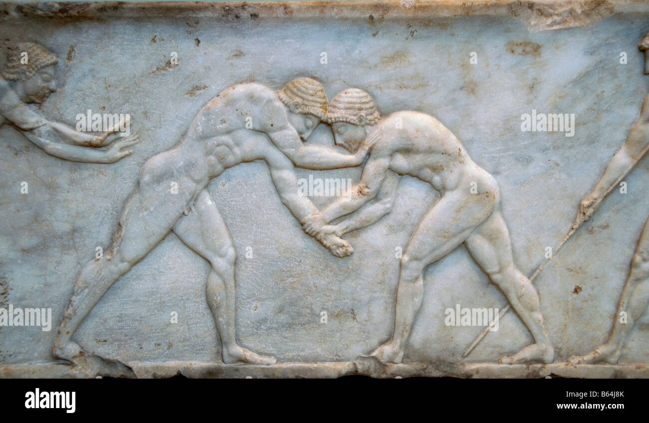 Wrestlers sarcophagus decoration  Athens Greek Greece Stock Photo