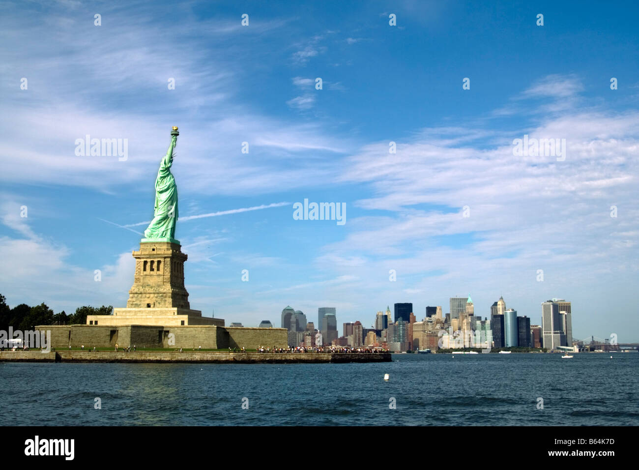 Statue of Liberty with Downtown Manhattan in background.  New York City, NY USA Stock Photo