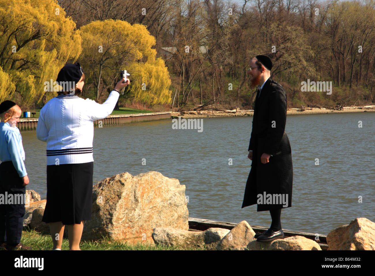 A Jewish man in traditional Hassidic wear, poses for a photograph Stock ...