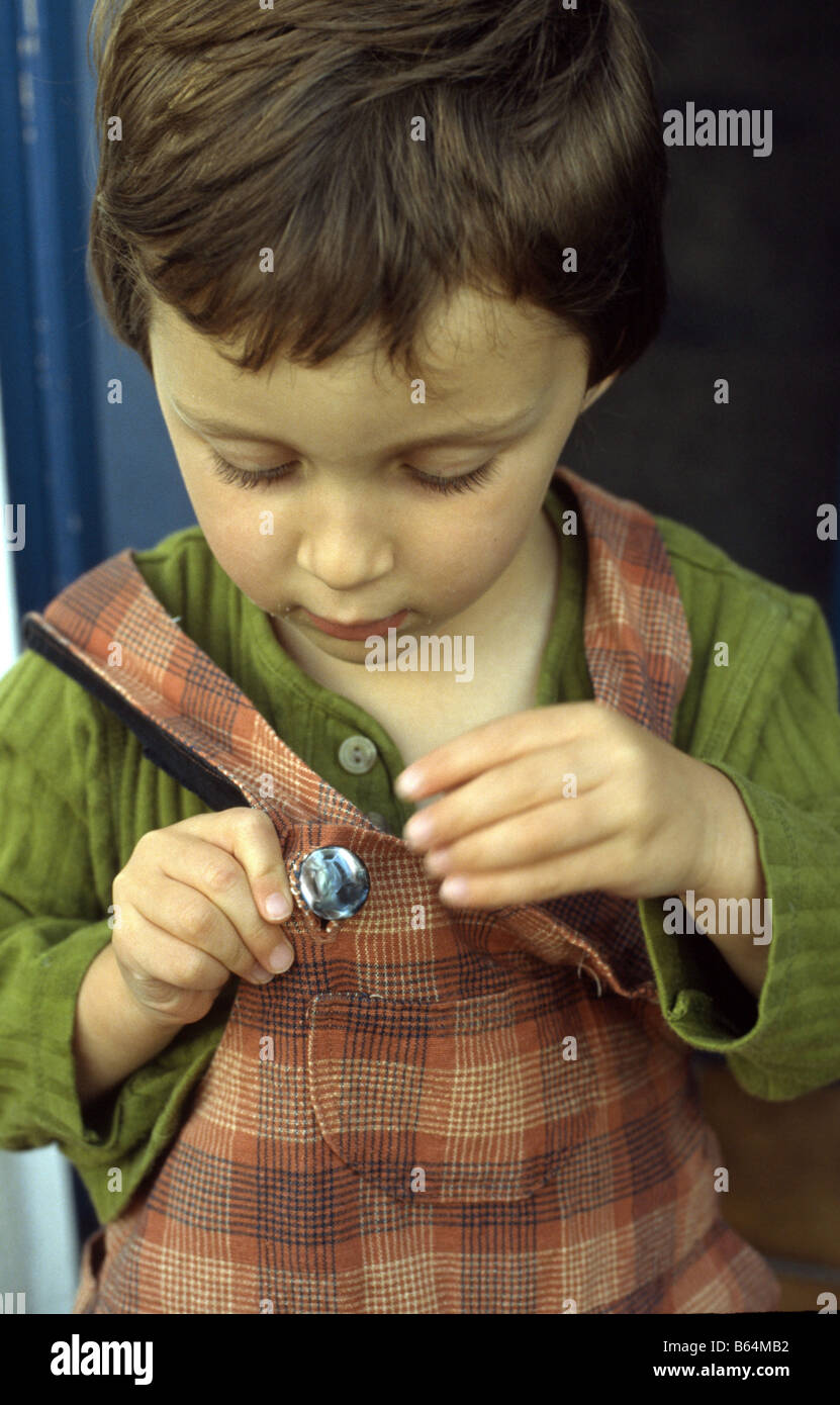 young girl dressing Stock Photo Alamy