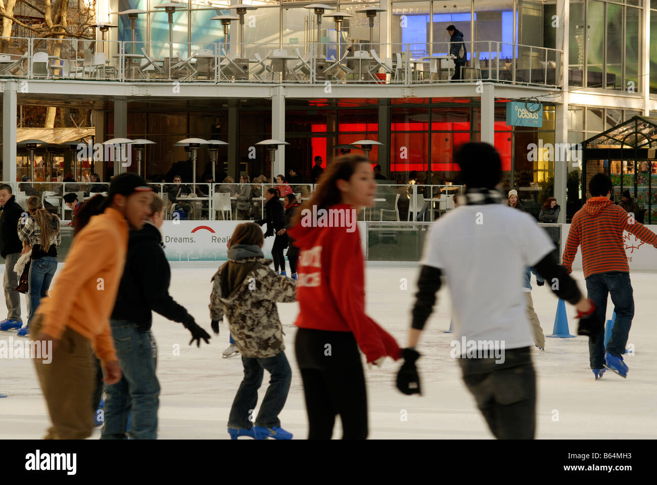 Skaters maneuver the packed Pond at Bryant Park ice skating rink in New York Stock Photo