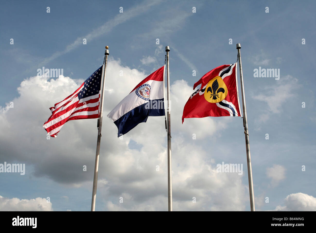 Three flags in on riverfront Gateway Arch St Louis Missouri Stock Photo