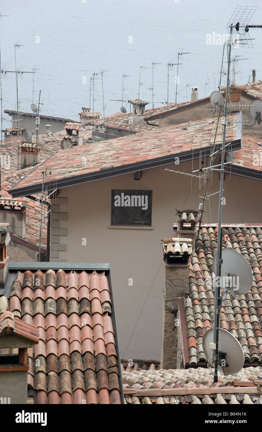 Television Aerials and Rooftops overlooking Limone sul Garda Lake Garda Italy Stock Photo