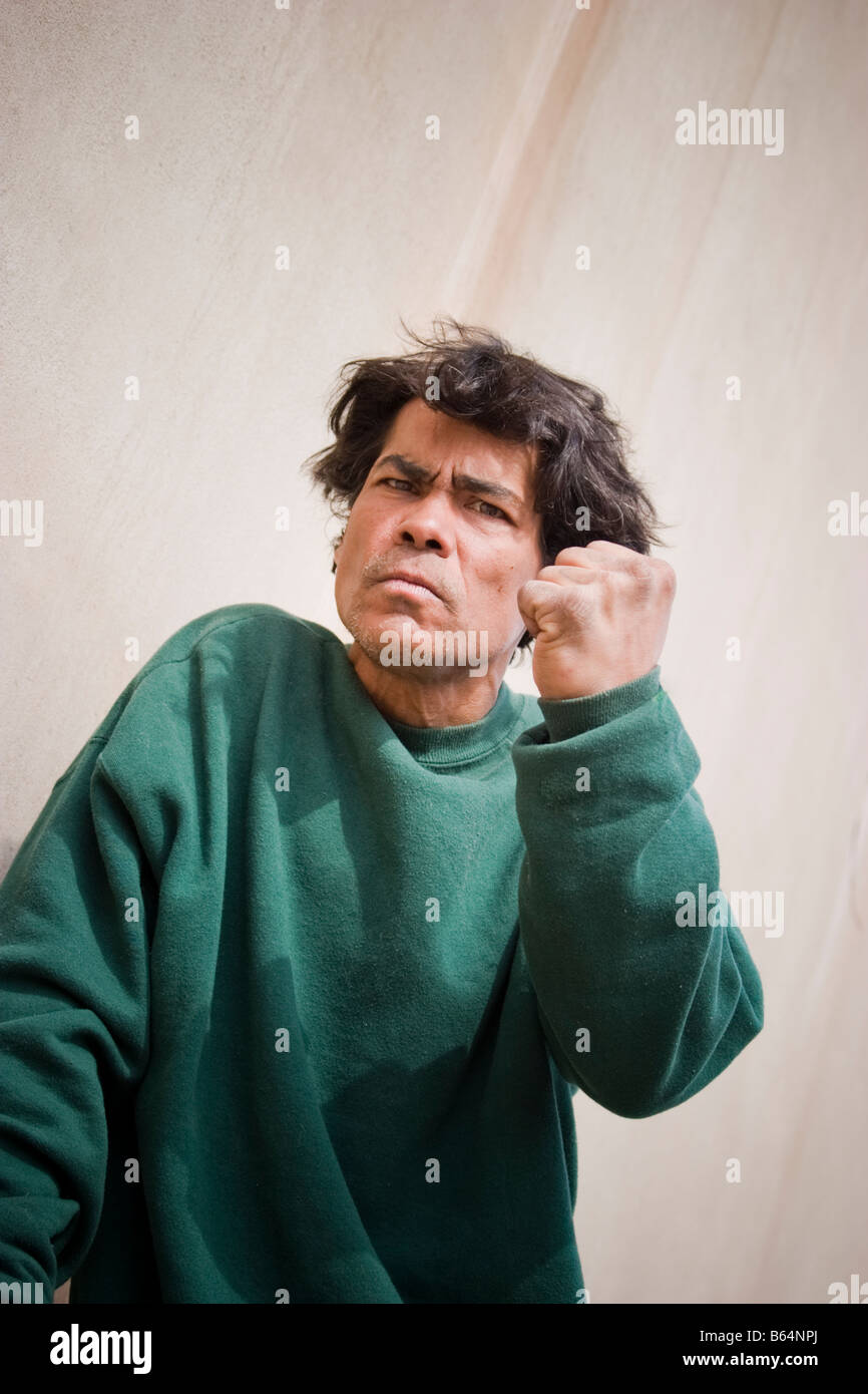 Young Hispanic man posing MODEL RELEASED Stock Photo
