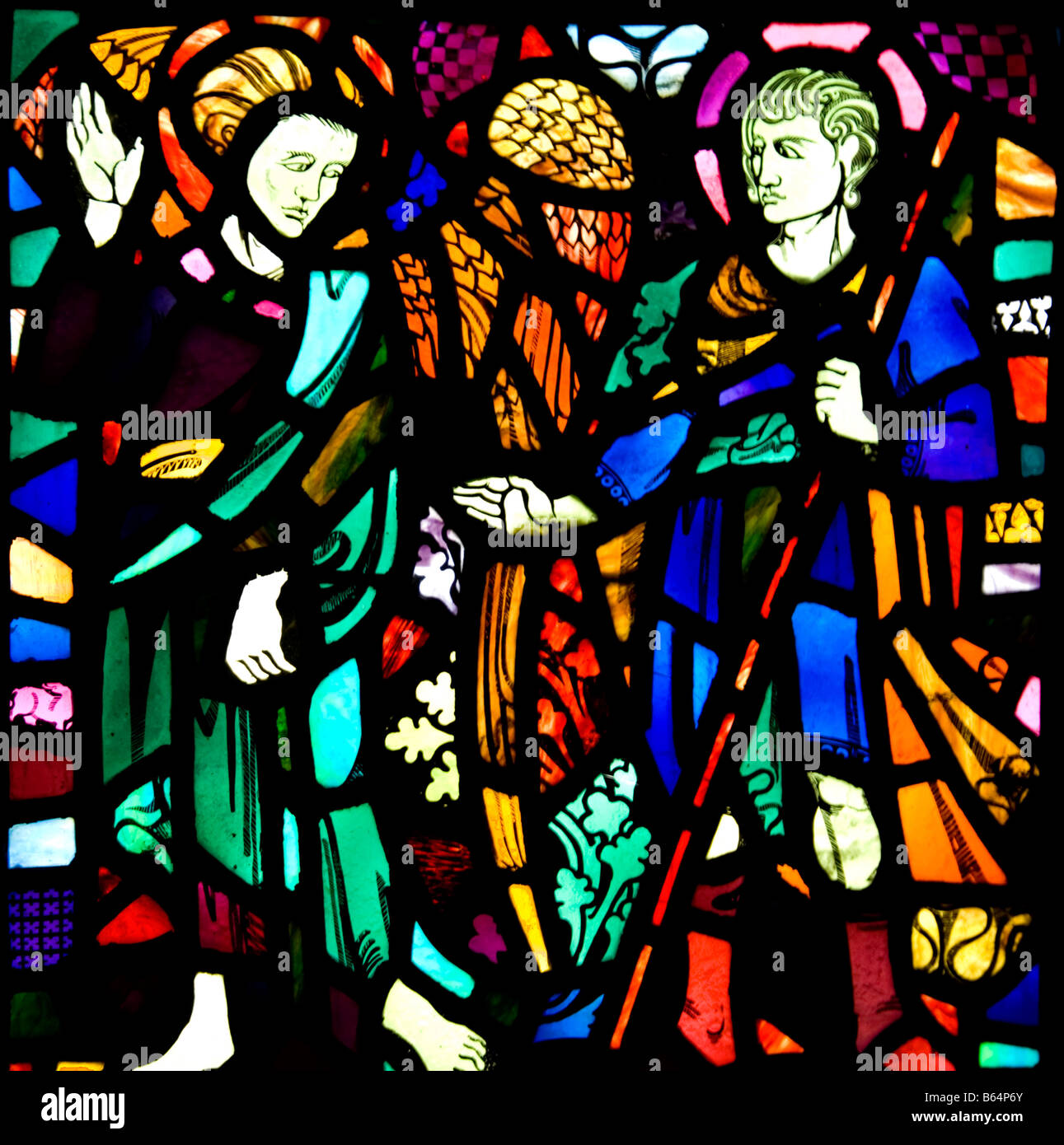 St Samson as a young Knight With an angel Depicted in the west wall window of the Nave of St Illtyd's Church Caldey Island Stock Photo