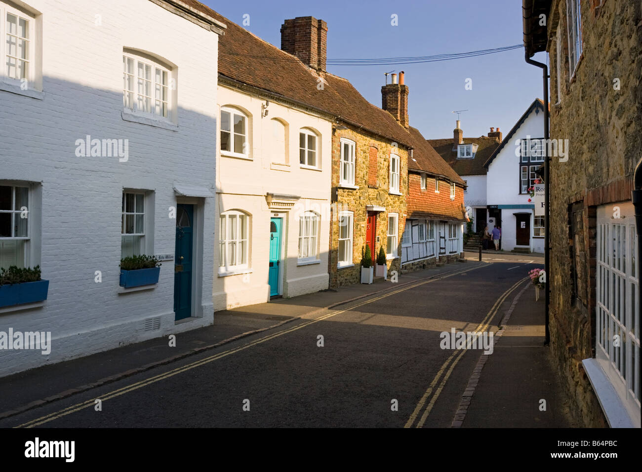 Small street and old terraced houses Petworth, West Sussex, England, UK - in the late afternoon Stock Photo
