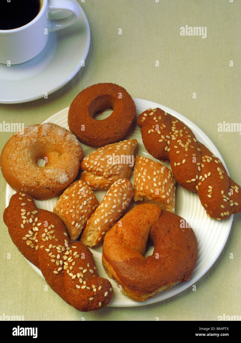 Iconic Greek Food Traditional Cookies KOULOURAKIA and Cup of Greek Coffee Stock Photo