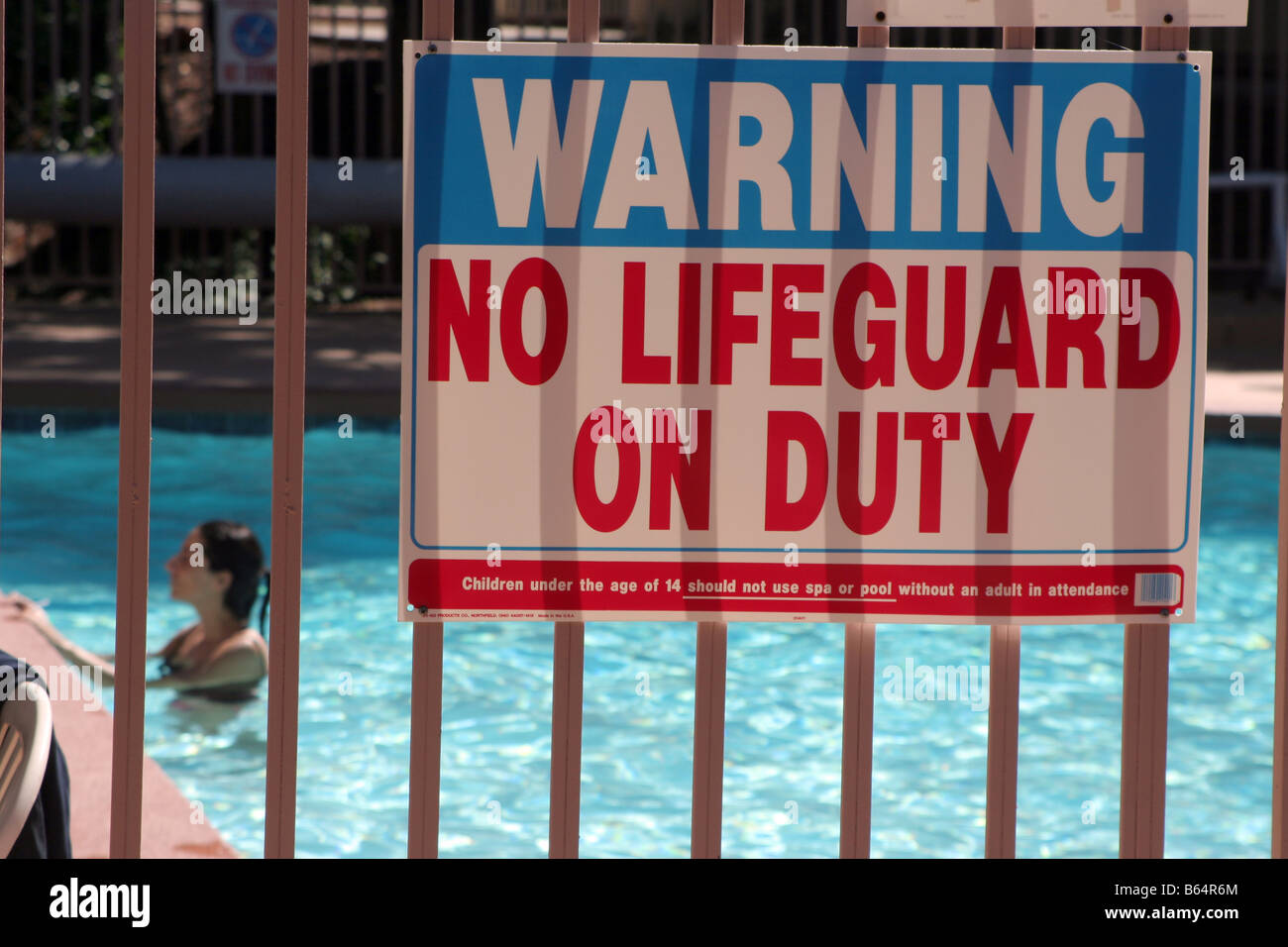 Warning sign outside hotel swimming pool in Palm Springs, California, United States of America. Stock Photo