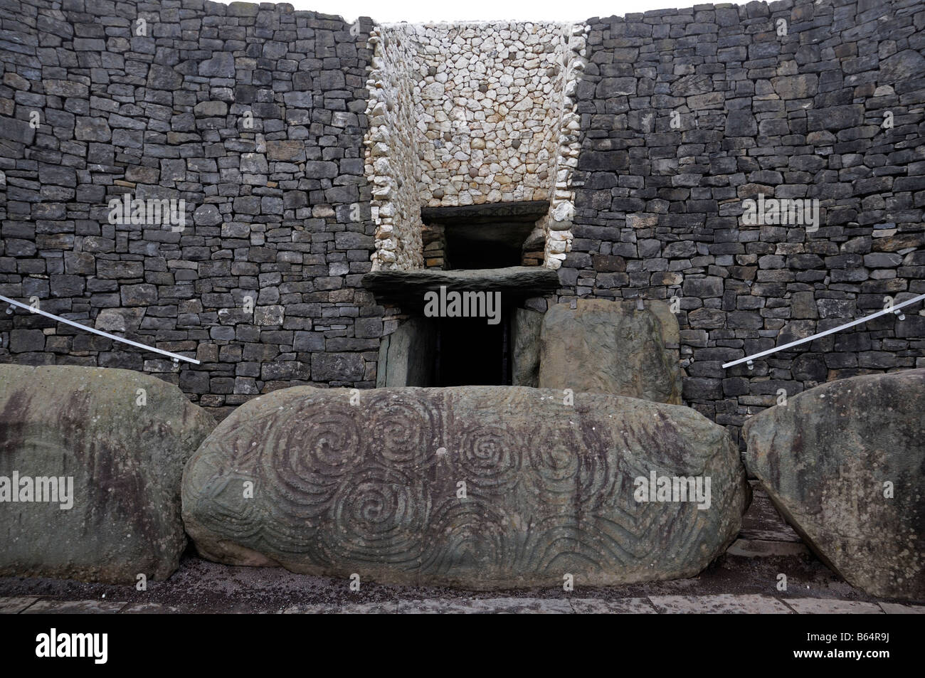 Detail closeup close up of the light box entrance stone and door Newgrange passage tomb winter solstice county meath ireland Stock Photo