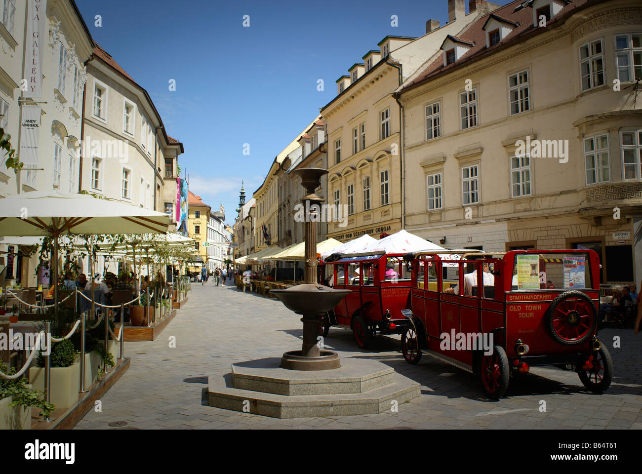 Tourist tour train and restaurnts in old town Bratislava Stock Photo