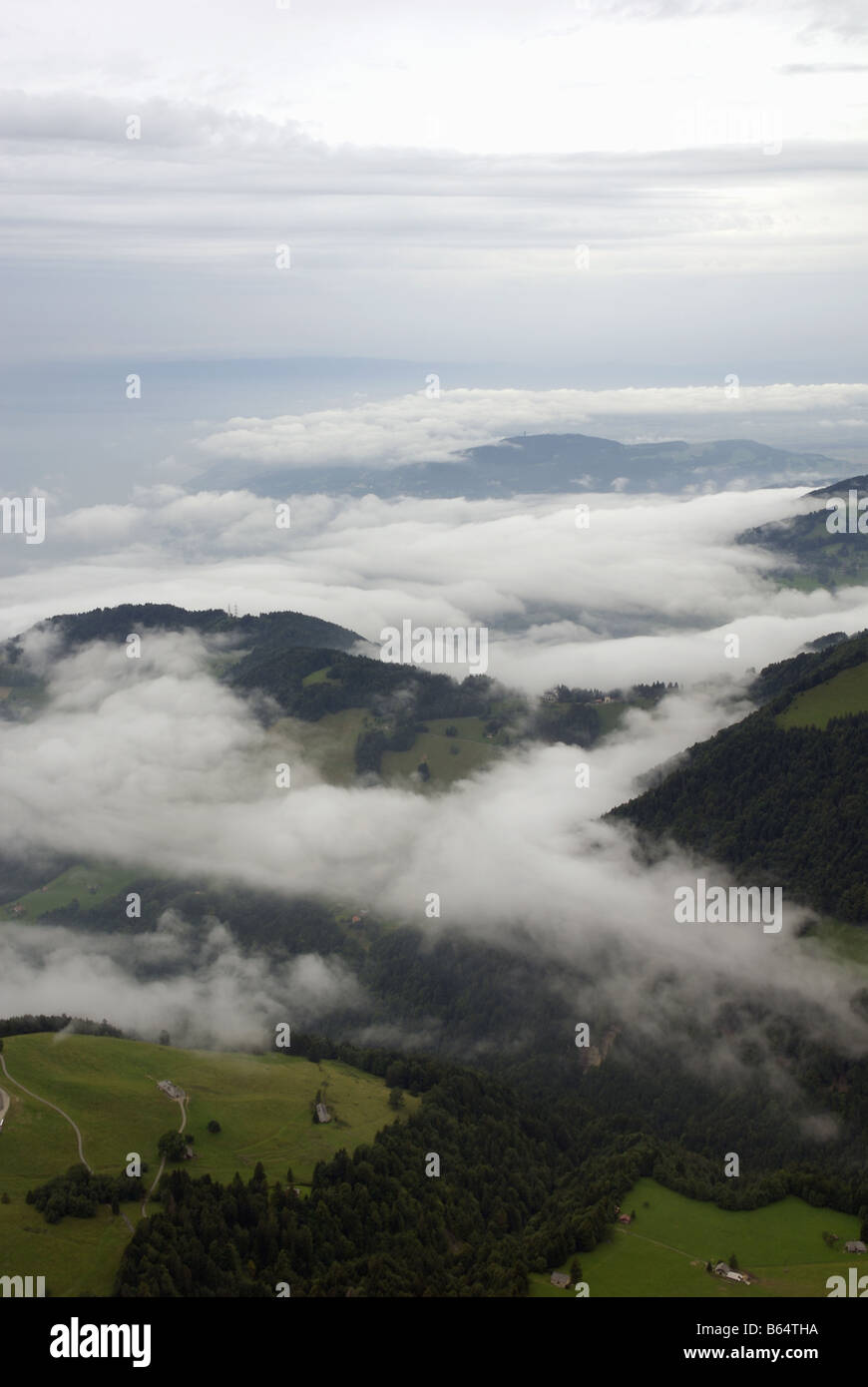 Switzerland s Bernese Alps with low cloud Photographed from the peak of La Dent de Jaman looking out over Lake Geneva Stock Photo