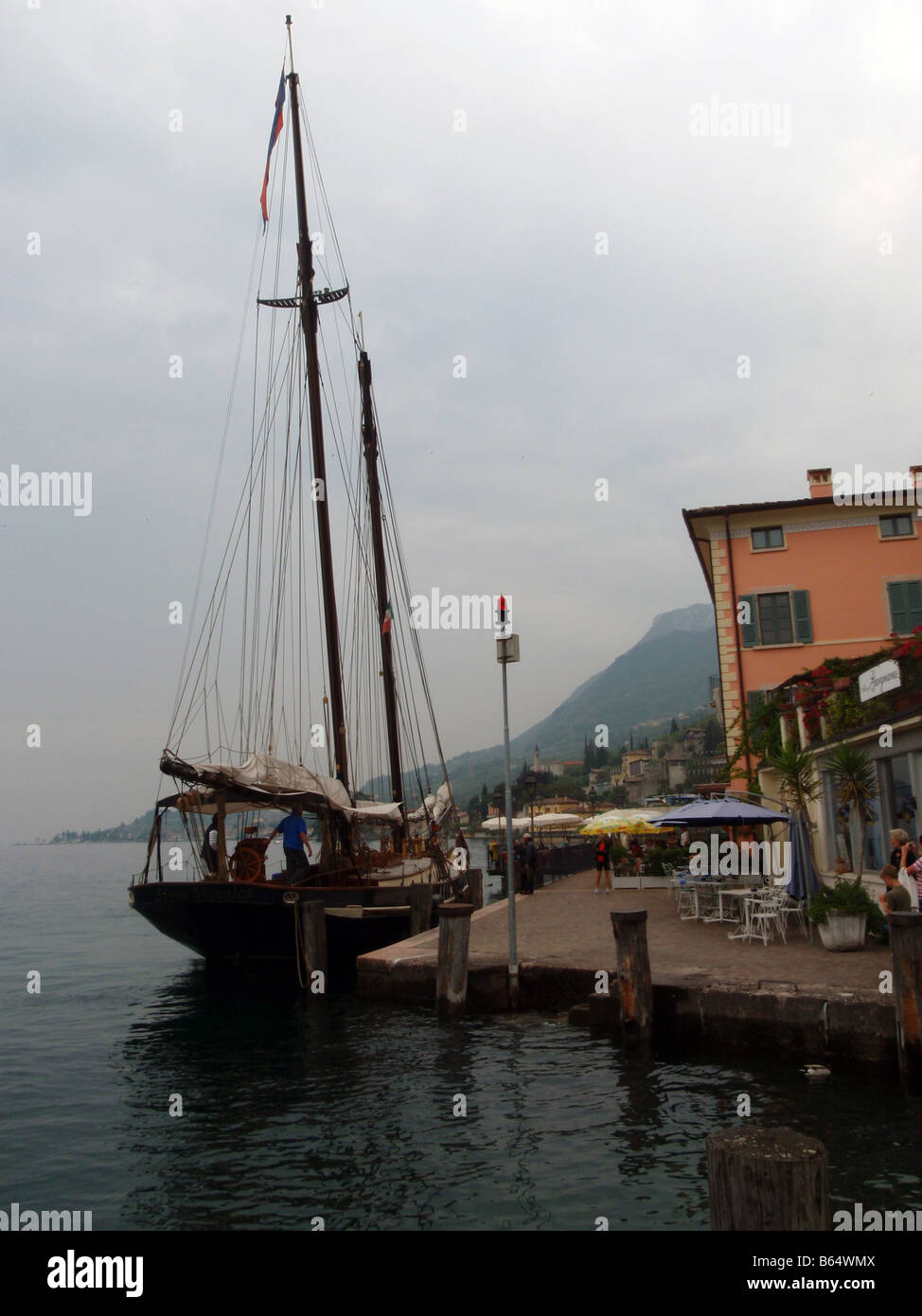 Sail Boat Docked on Lake Garda [Lake Garda, Verona/Brescia/Trento, Veneto/Lombardy/Trentino-Alto Adige/Südtirol, Italy, Europe]. Stock Photo