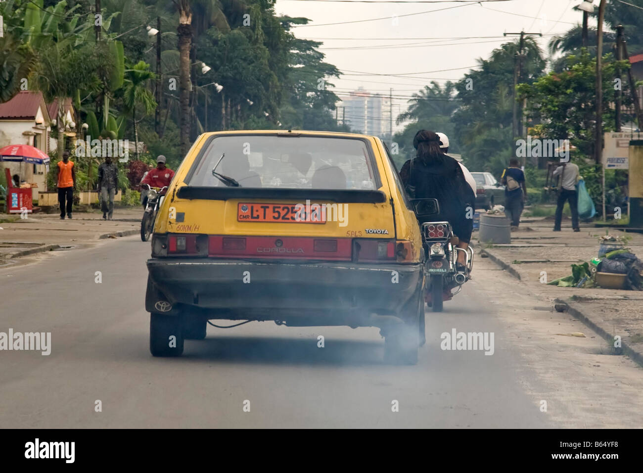 Taxi exhaust fumes, Douala, Cameroon, Africa Stock Photo