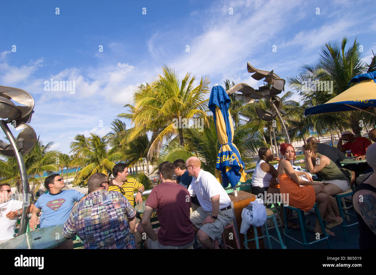 Miami Beach Florida,Miami Music Week,pool party,crowd,standing,dancing,drink  drinks beverage beverages drinking,young adult,men,women,stage,lighting,t  Stock Photo - Alamy