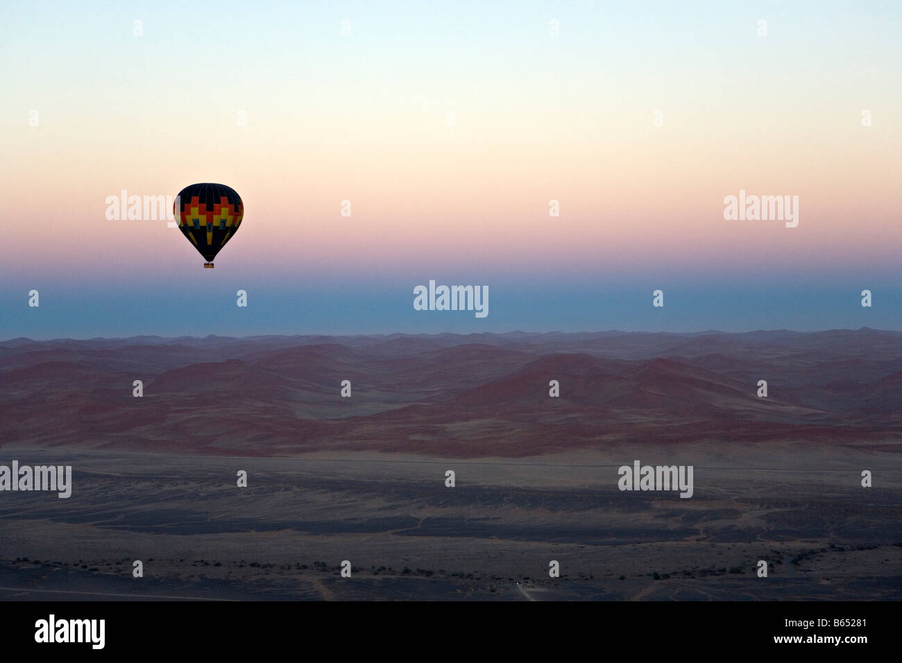 Hot air ballooning over Namib Desert dunes Naukluft NP Namibia Stock Photo