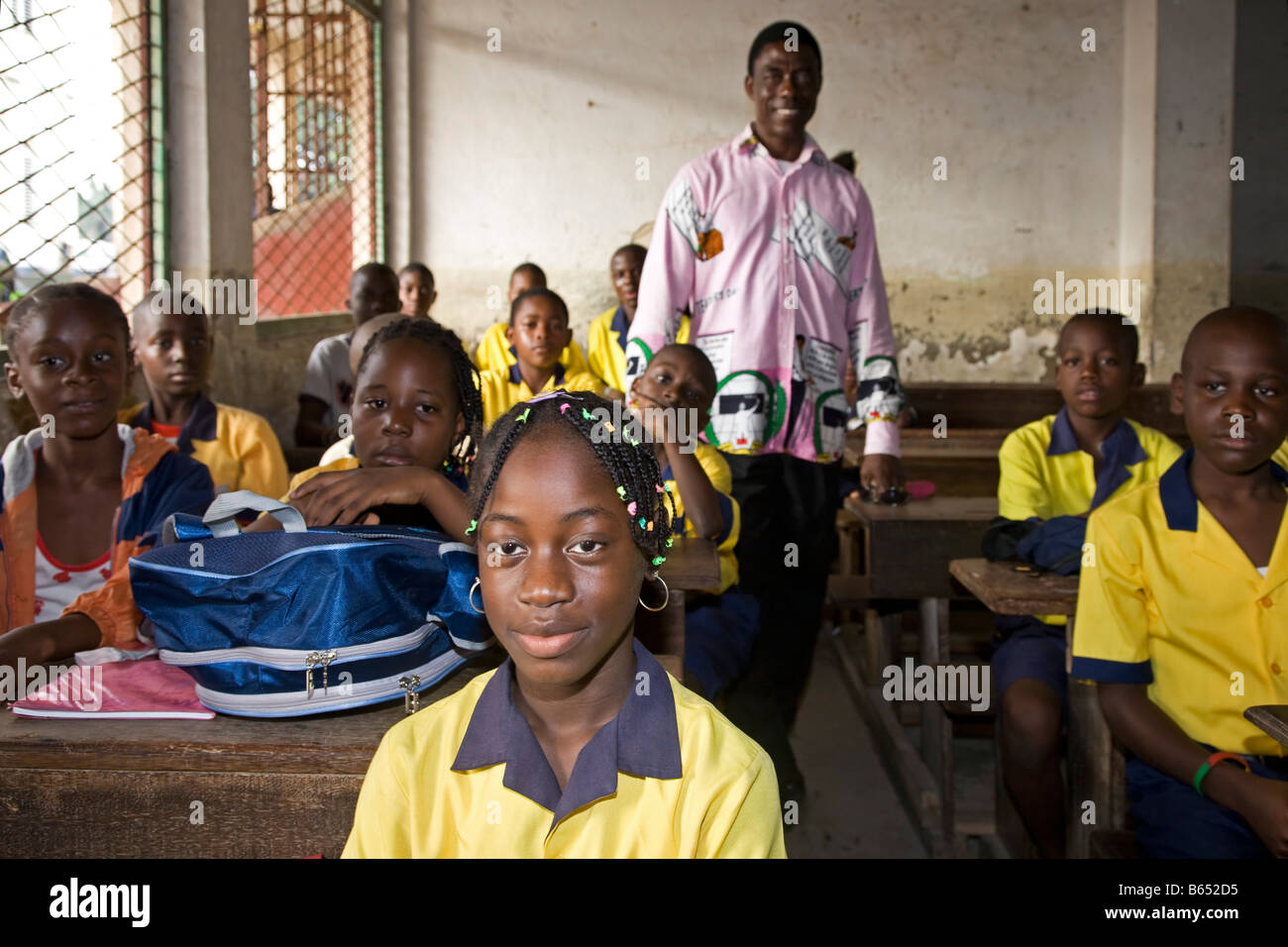 Students and teacher in school classroom, Douala, Cameroon, Africa Stock Photo