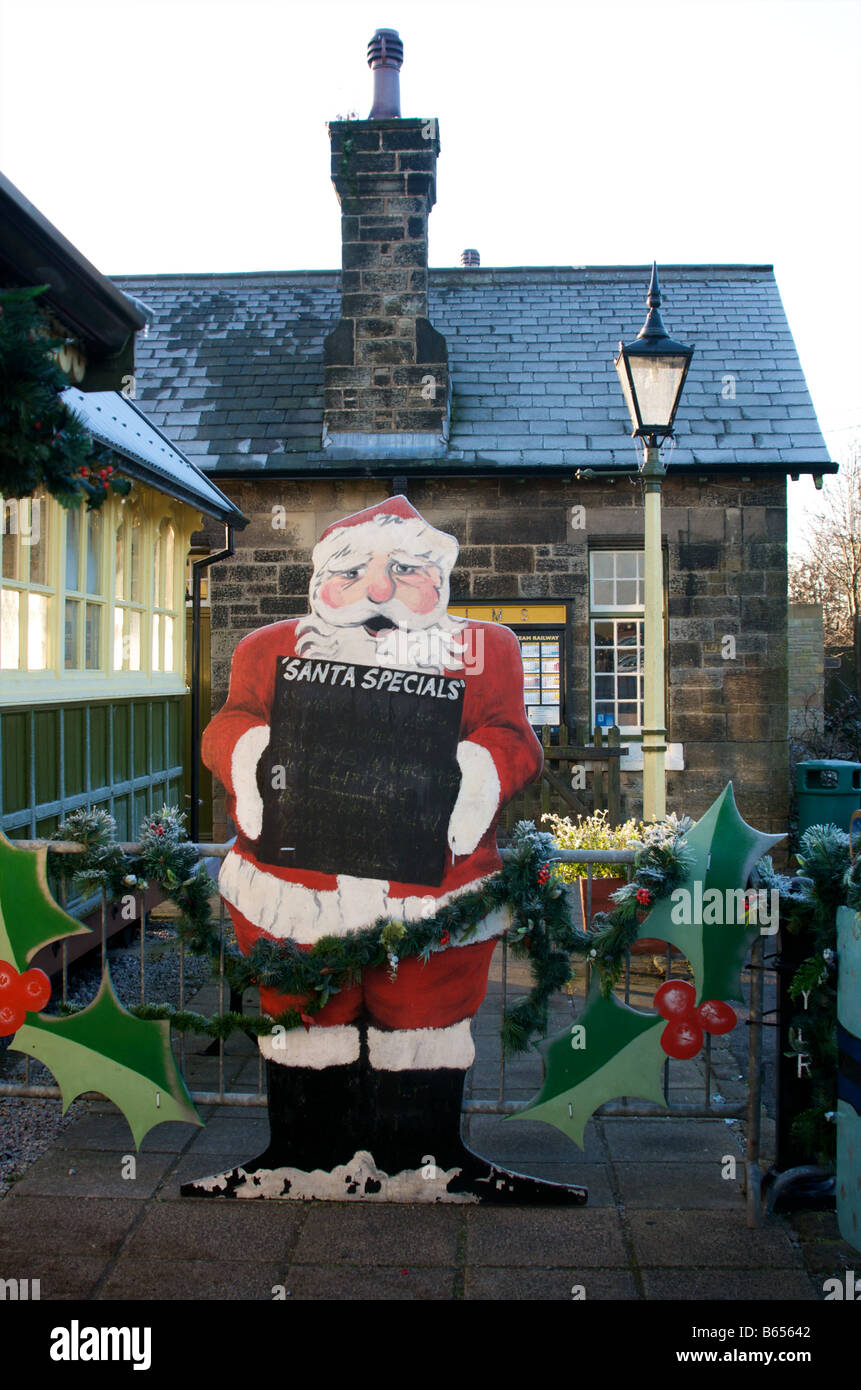 A poster board with Santa Claus at Embsay Station, near Skipton Stock Photo