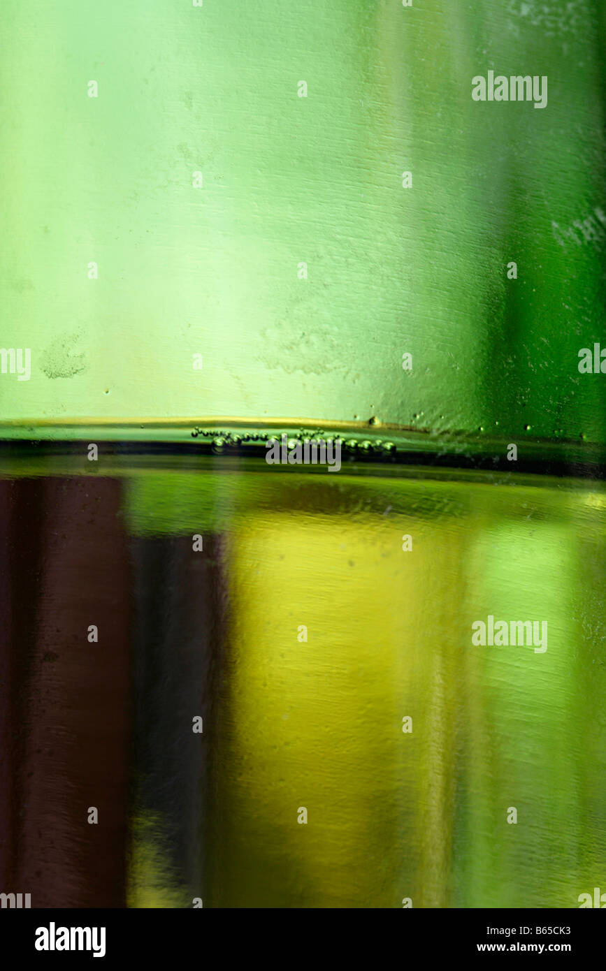 Bubbles at surface of white wine in bottle Stock Photo Alamy