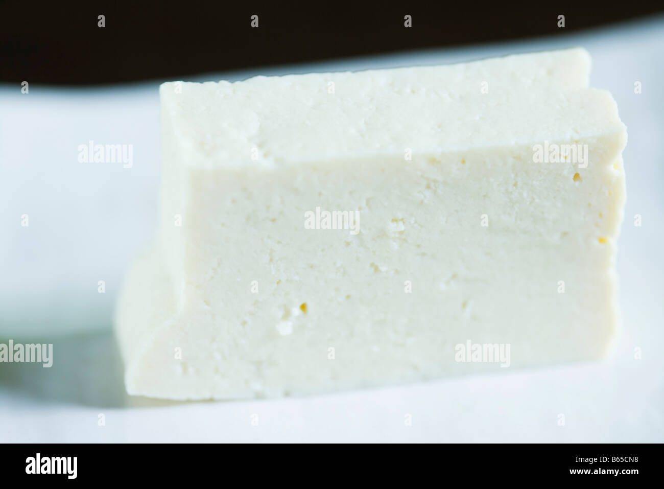 Block of firm tofu, close-up Stock Photo - Alamy